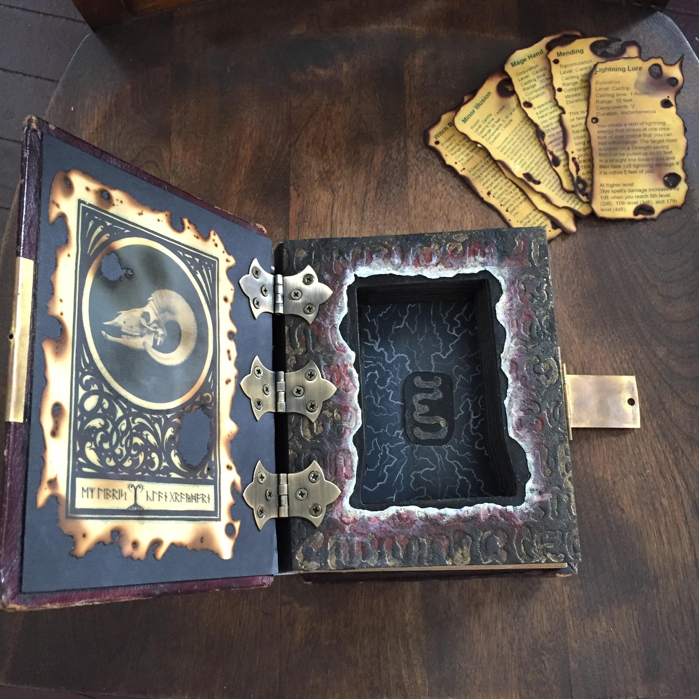 Made a spellbook/spellcard box out of an antique photo album for my Clan Grayhorn gnome wizard