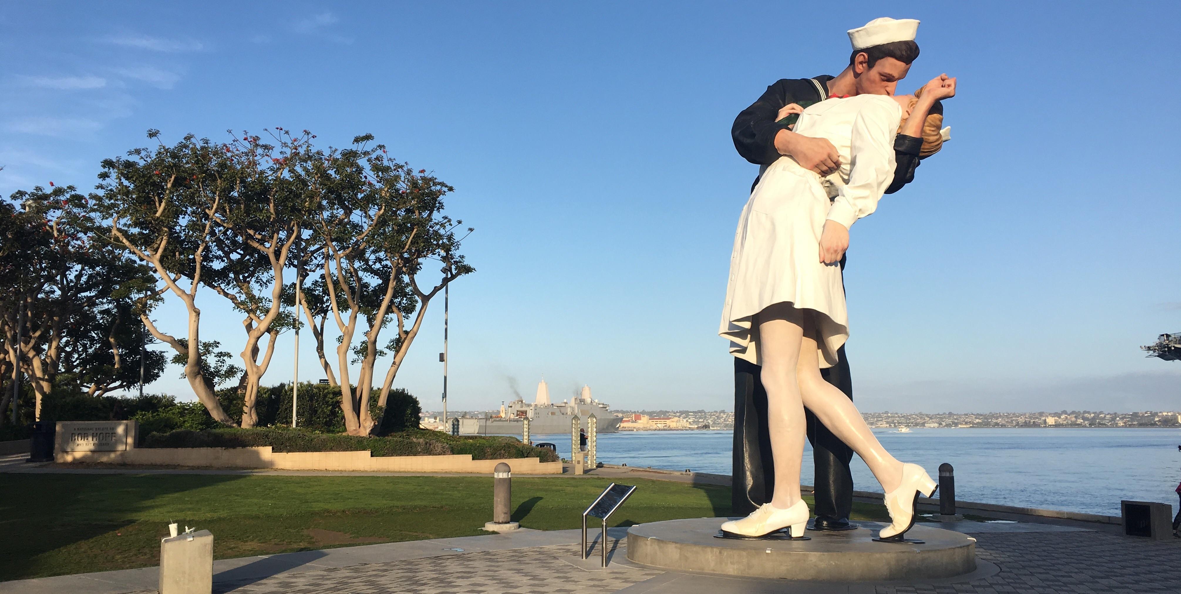 The "Embracing Peace" statue with the (I think) USS San Diego in the