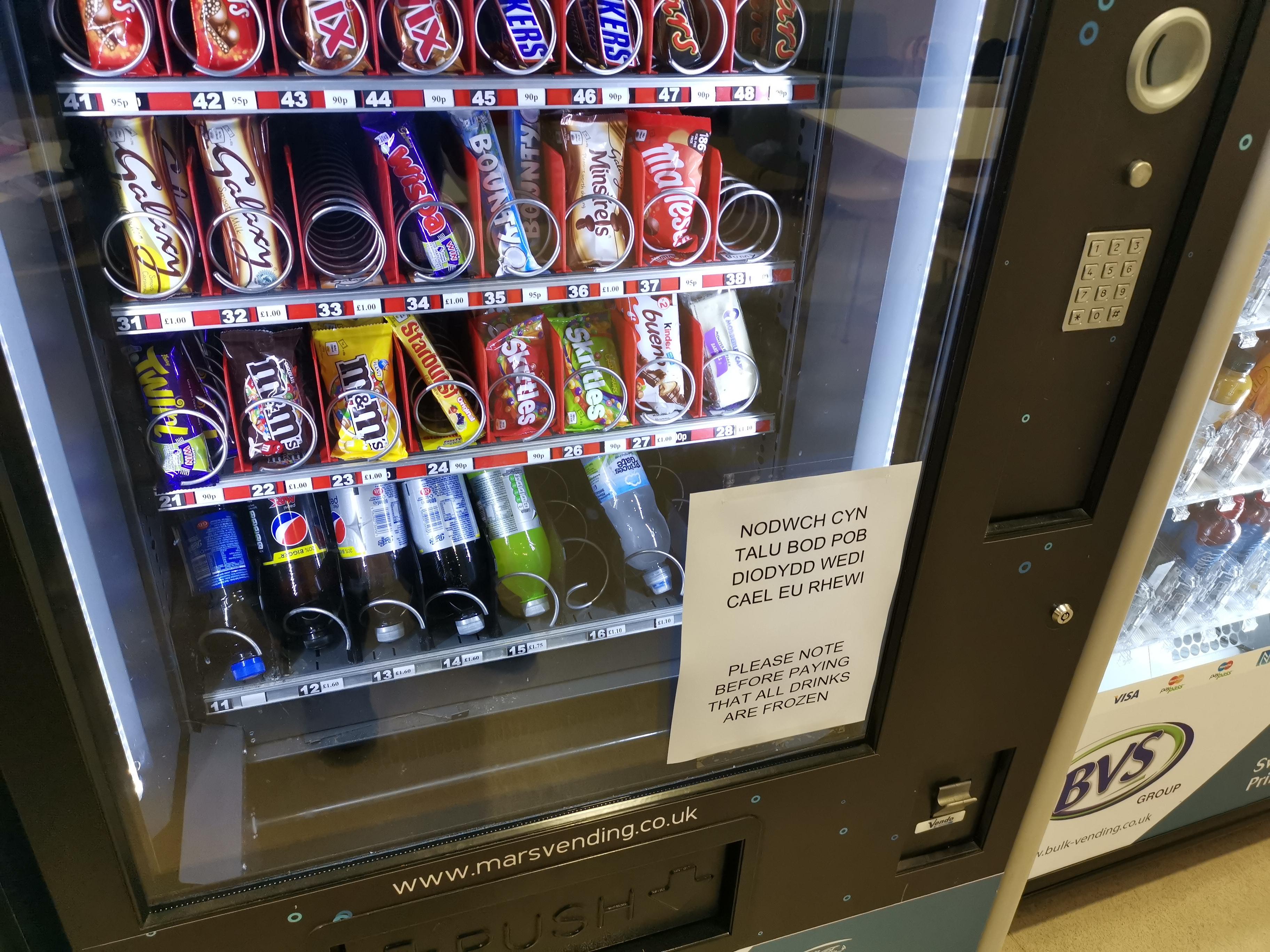 Update on the frozen vending machine. It now has a sign. onejob