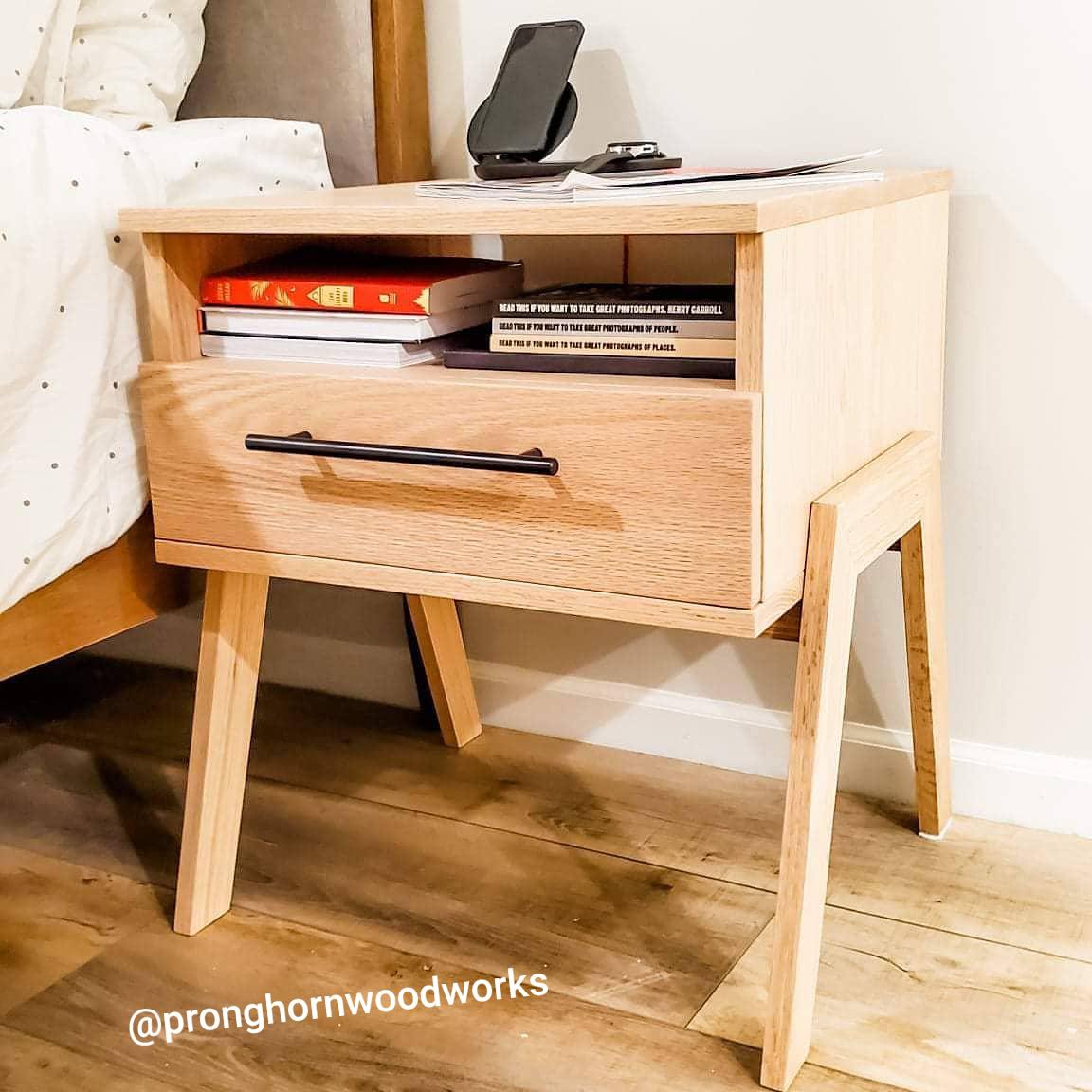 My first real furniture piece. Red oak nightstand I designed and built