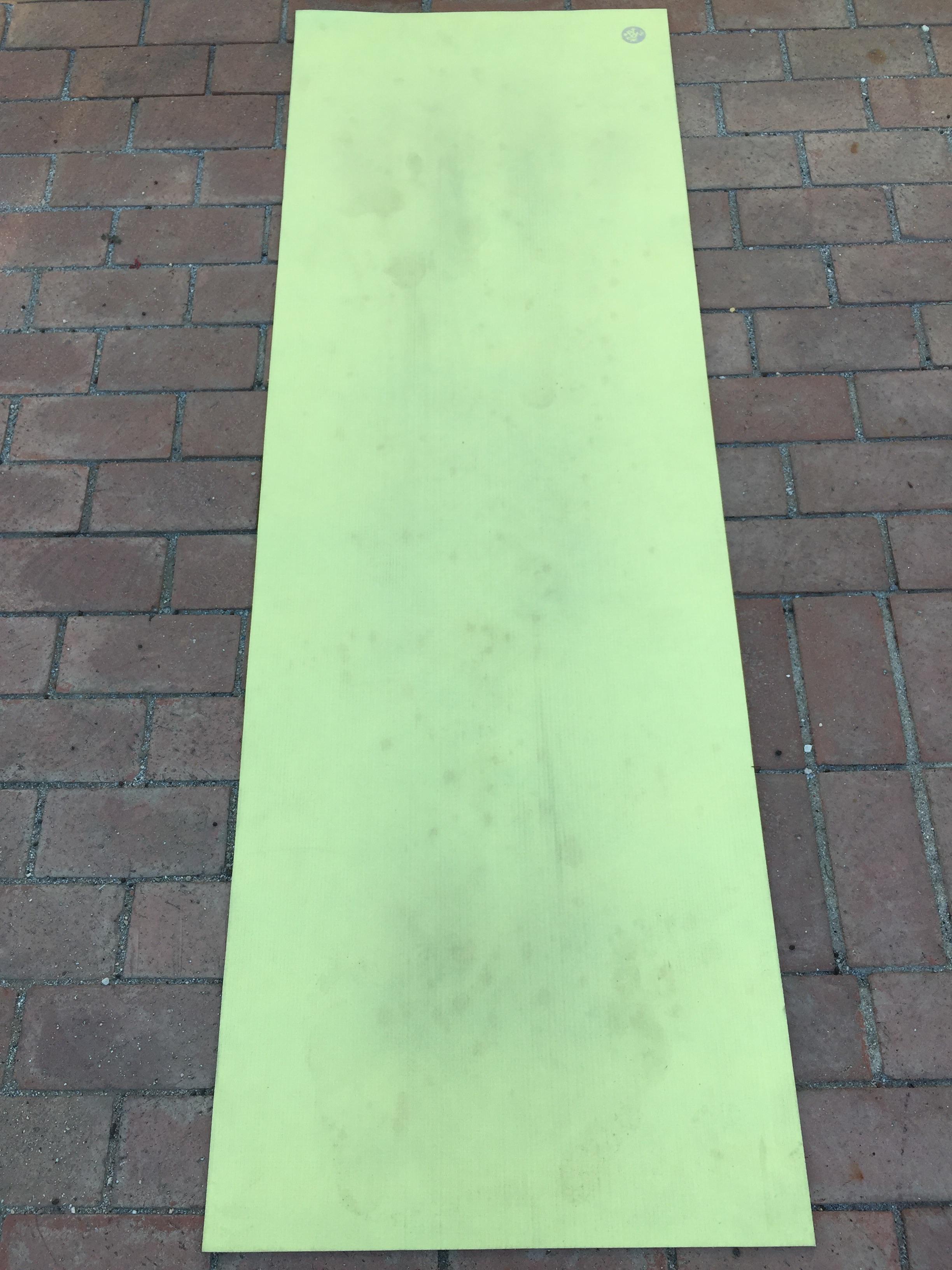 Yellow Manduka mat developed polka dots and is super dirty... how to