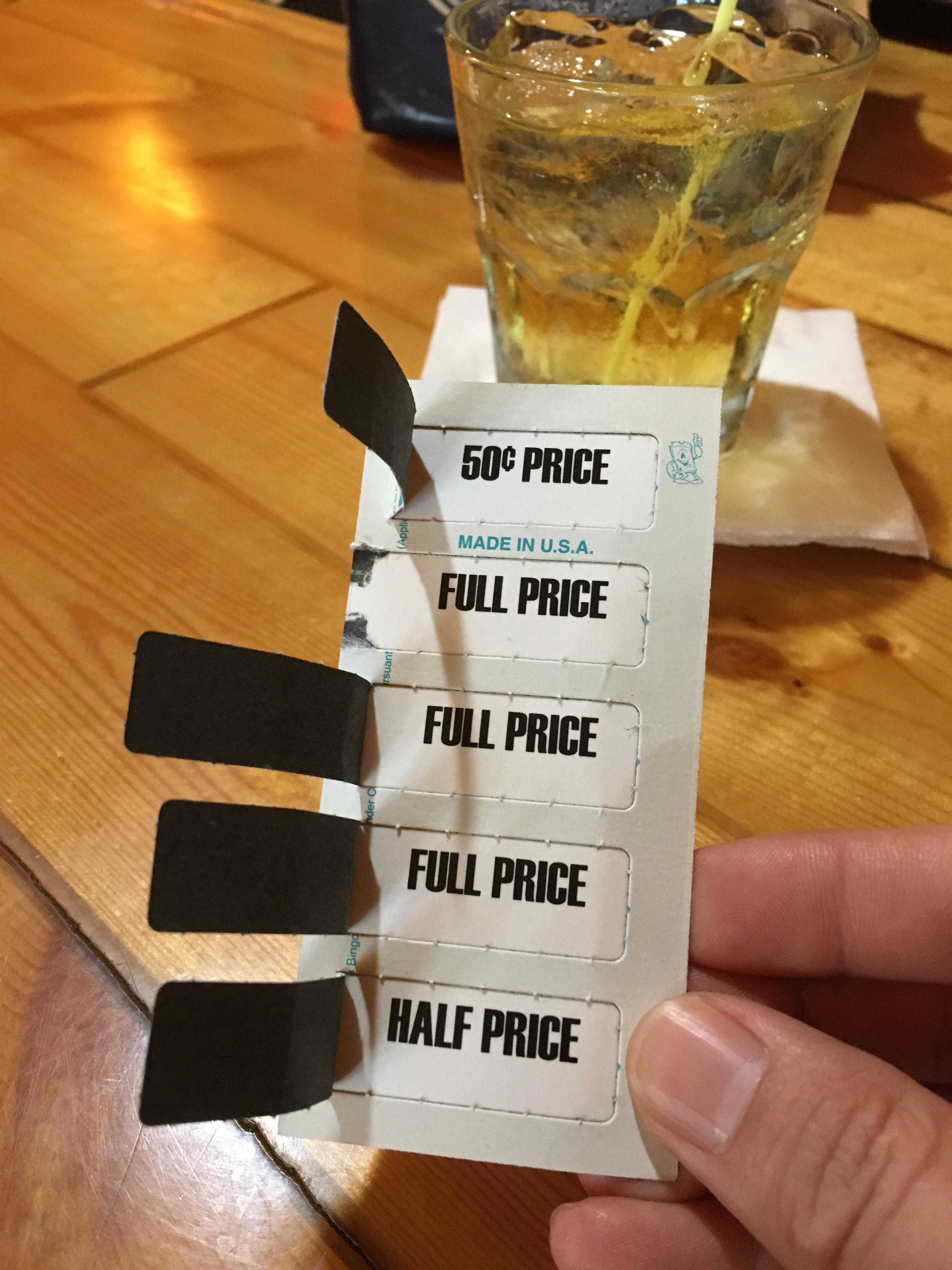 A pull tab to determine the price you pay at happy hour. r