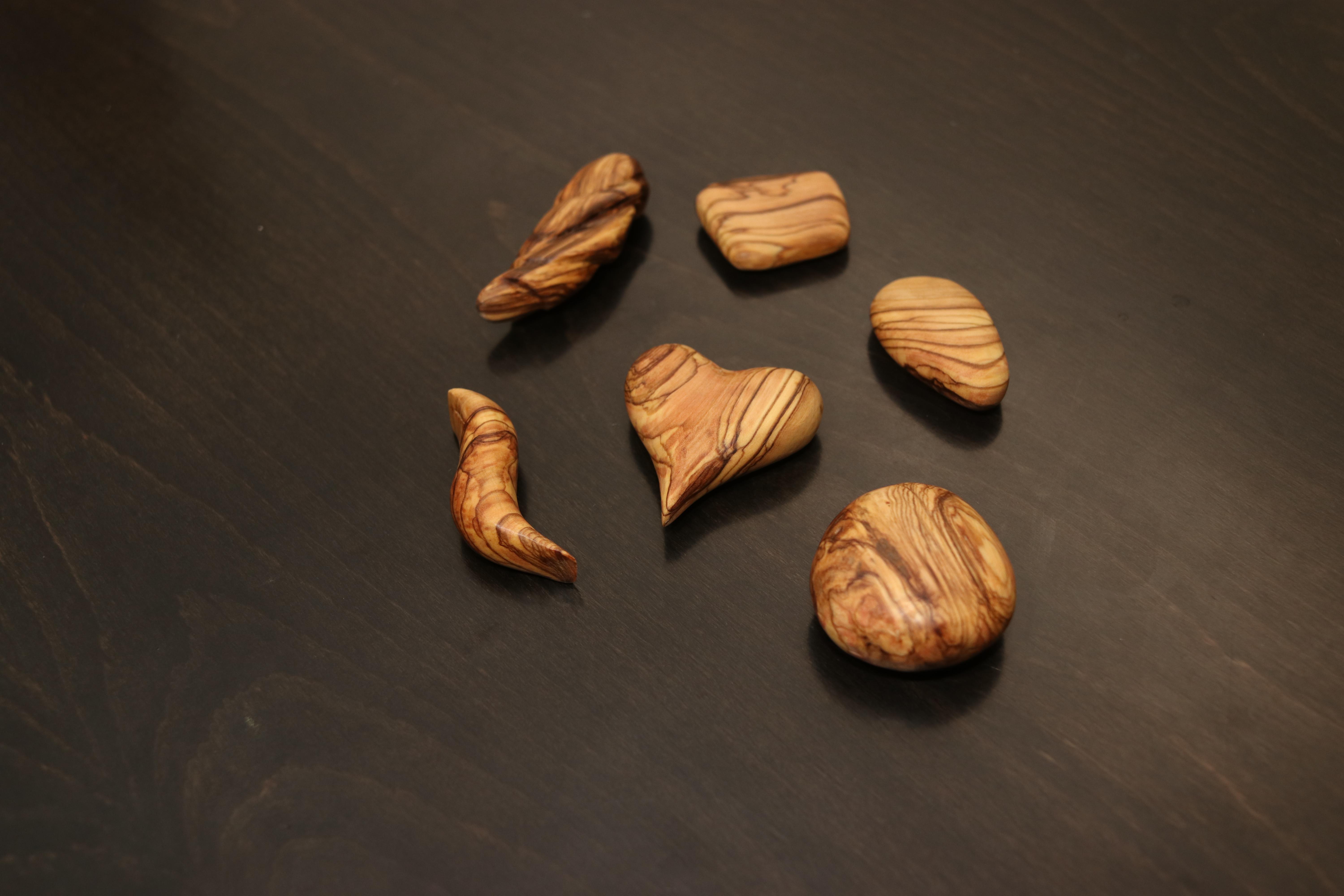 simple pendants Carved of Olive wood, goal practicing wood carving