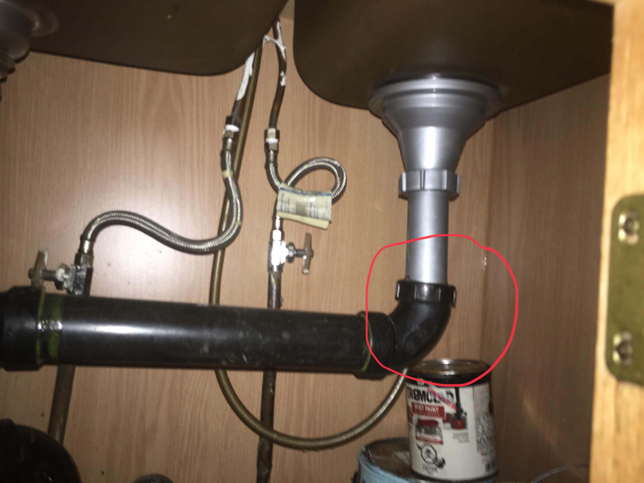 Kitchen sink leaking heavily from circled area when sink drains