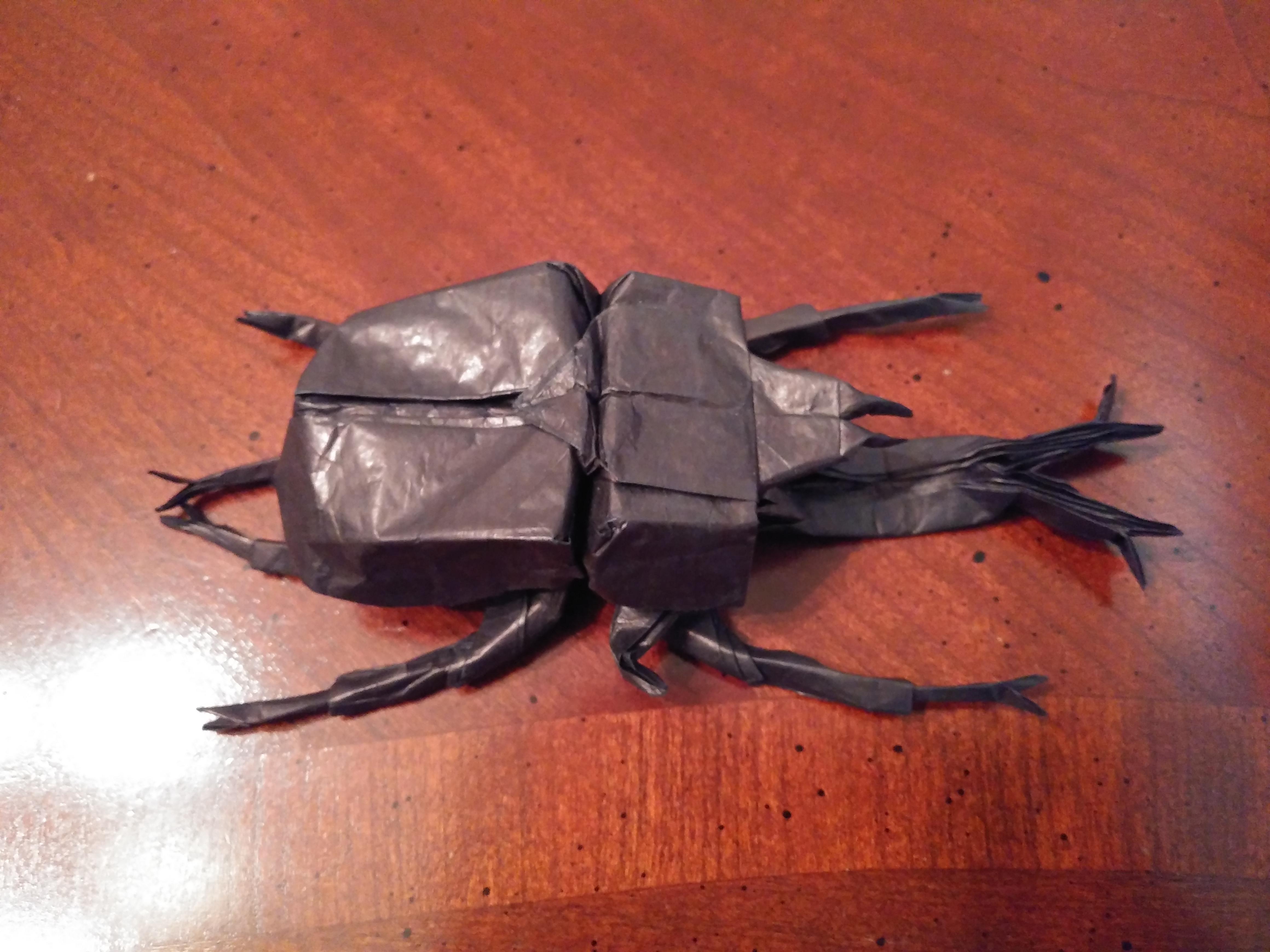 Samurai Helmet Beetle Designed by Robert Lang and Folded by me r/origami