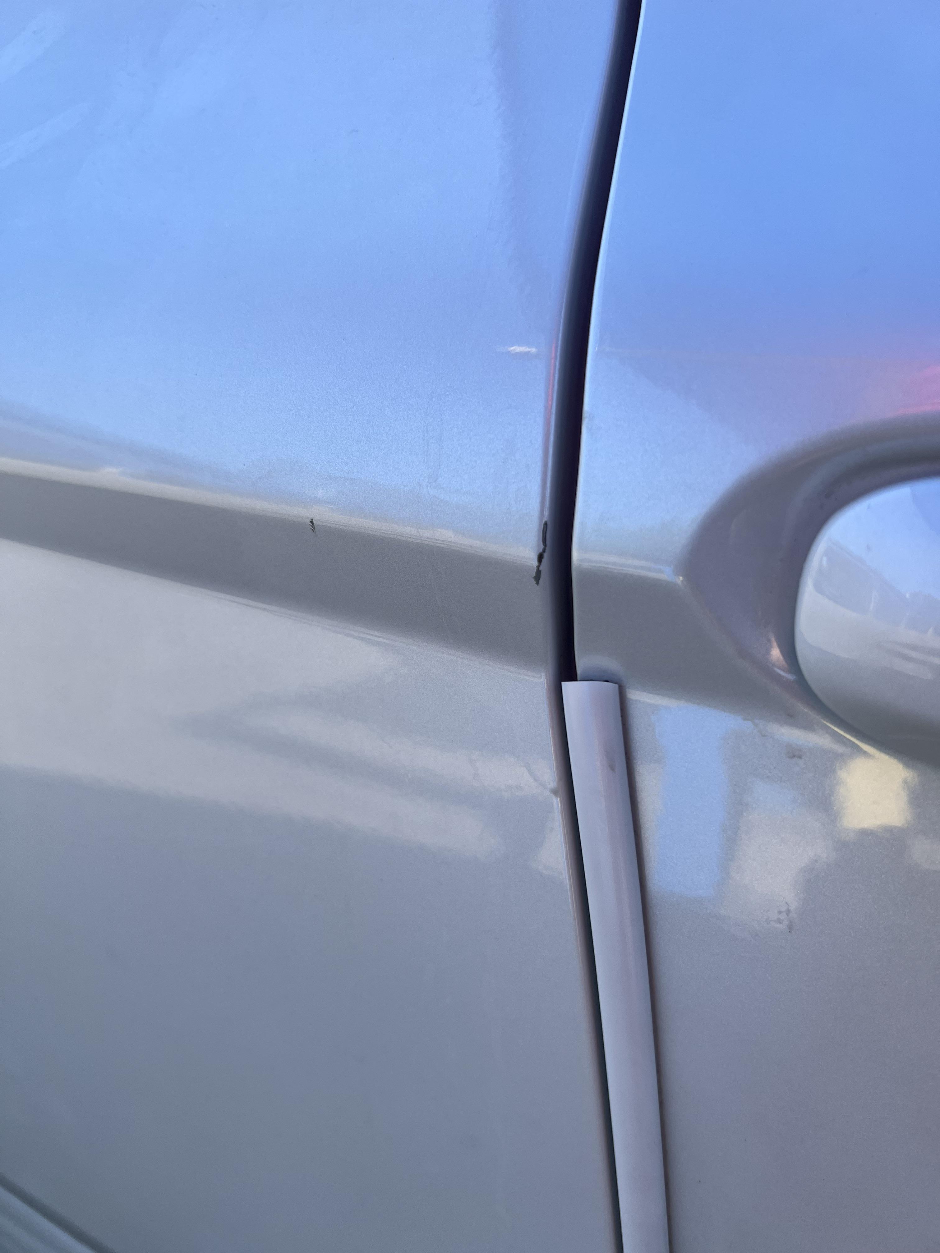 Where my paint guys at? Ding/chip on door of my brand new car. Less