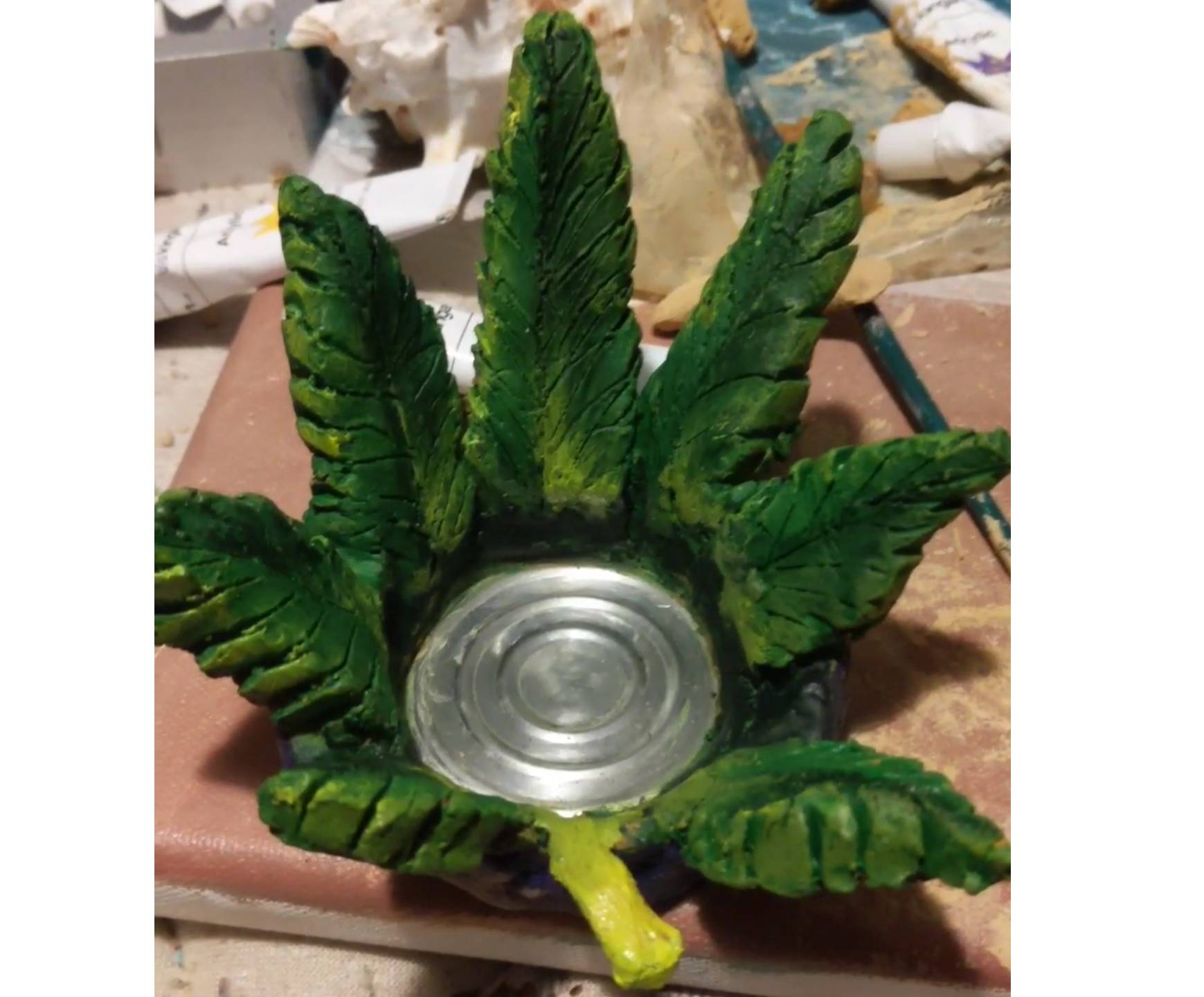 Air dry clay ashtray, what can I put over it to prevent from damaging