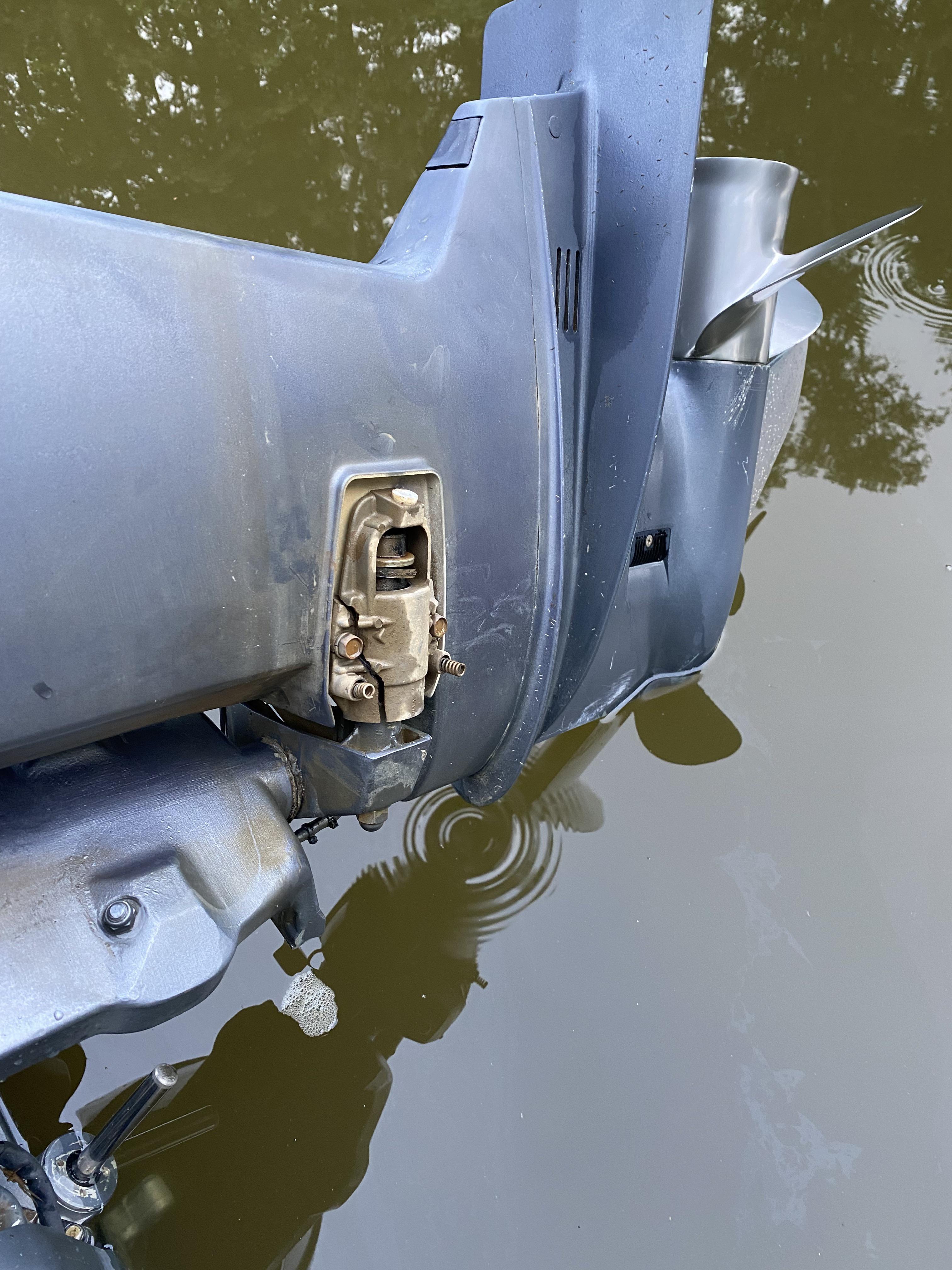 Help identifying this outboard part. Has a cover that goes over it