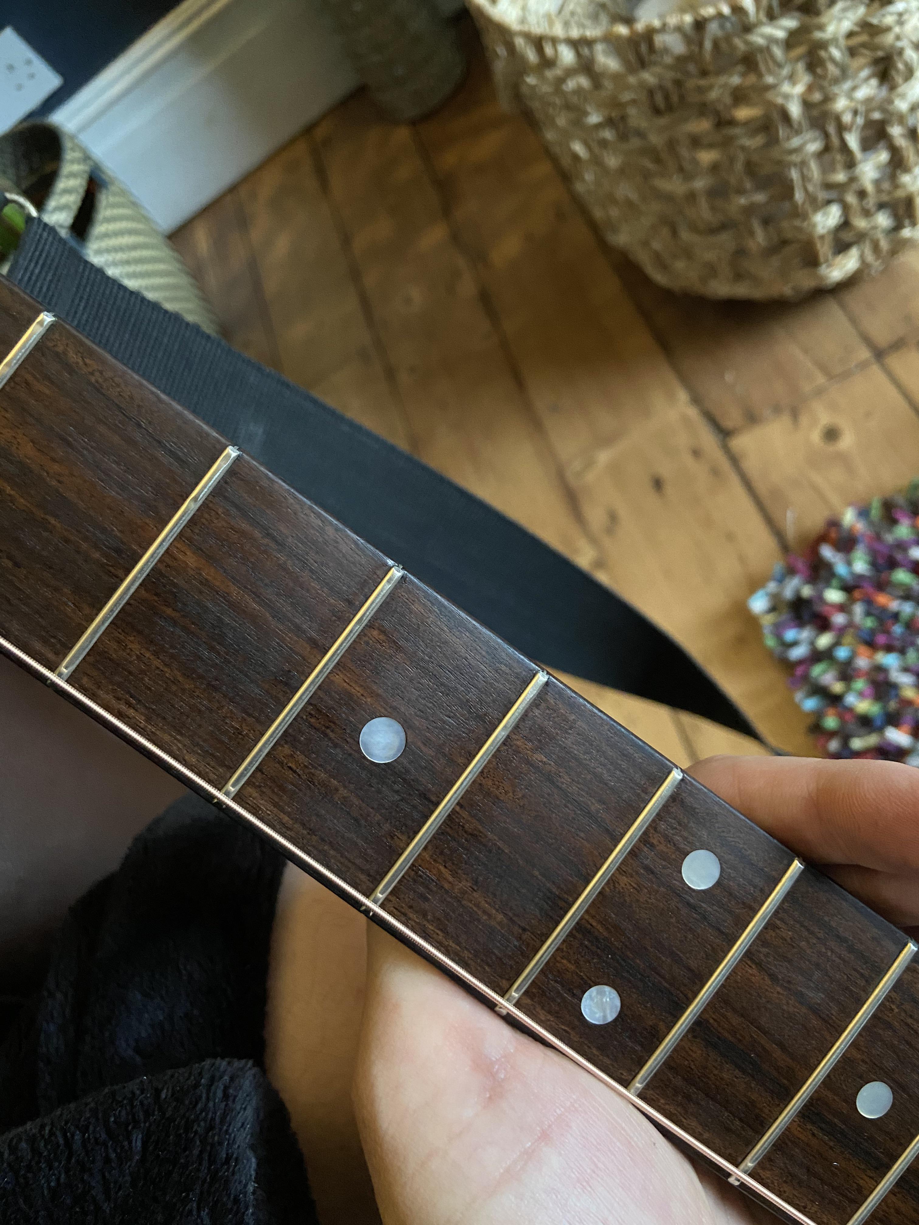 Hazy fretboard?? Even after cleaning, my rosewood fretboard has a milky