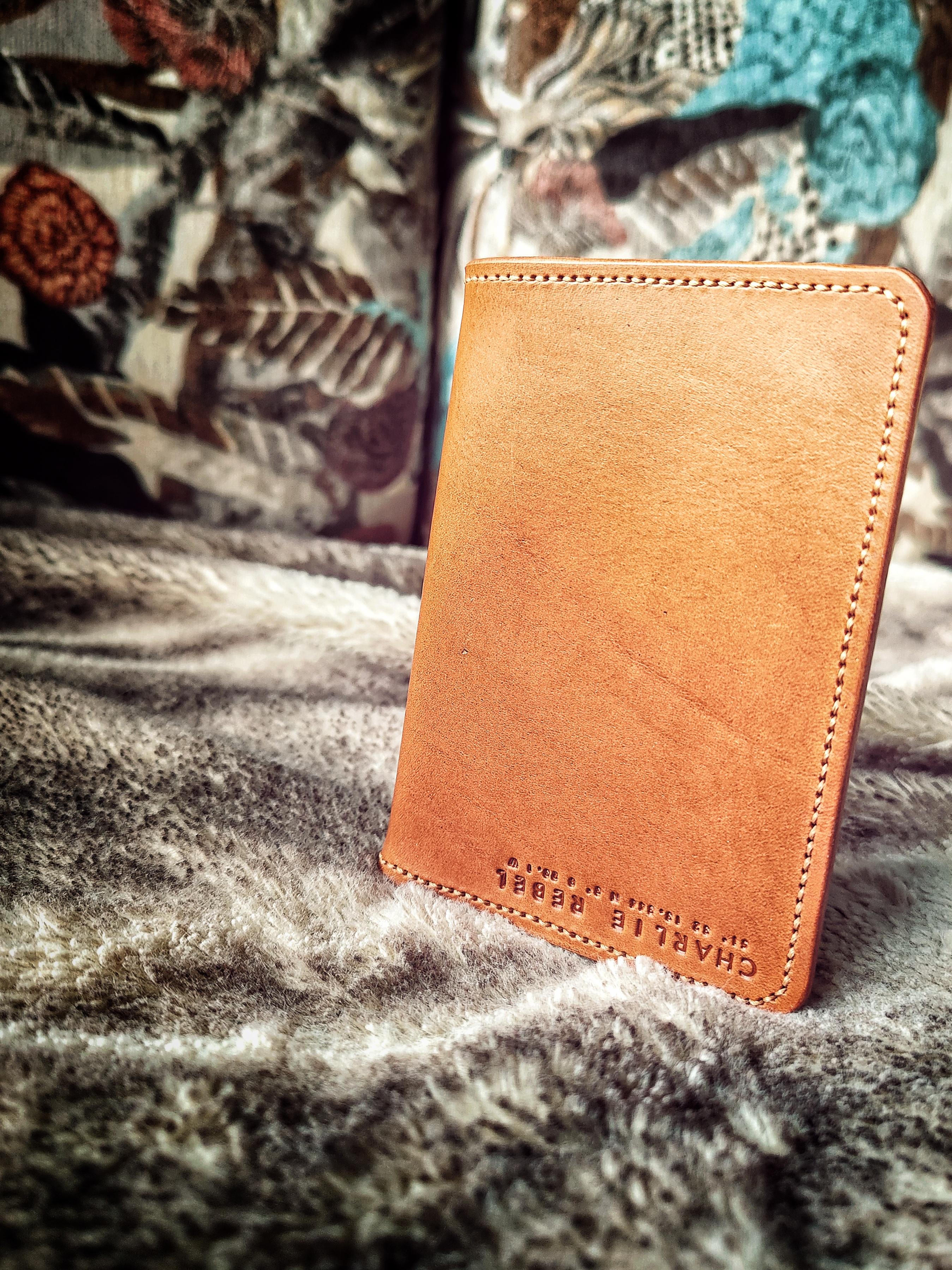 Passport holder for the Mrs completed. Still learning saddle stitching