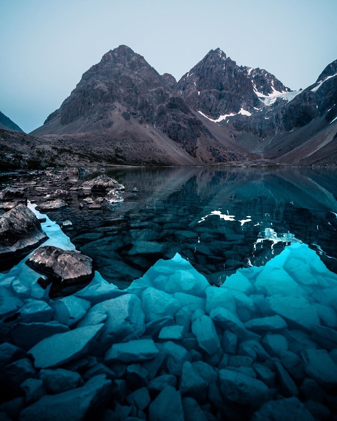 True blue. Crystal clear Glacier water in the Lyngen Alps r/pics