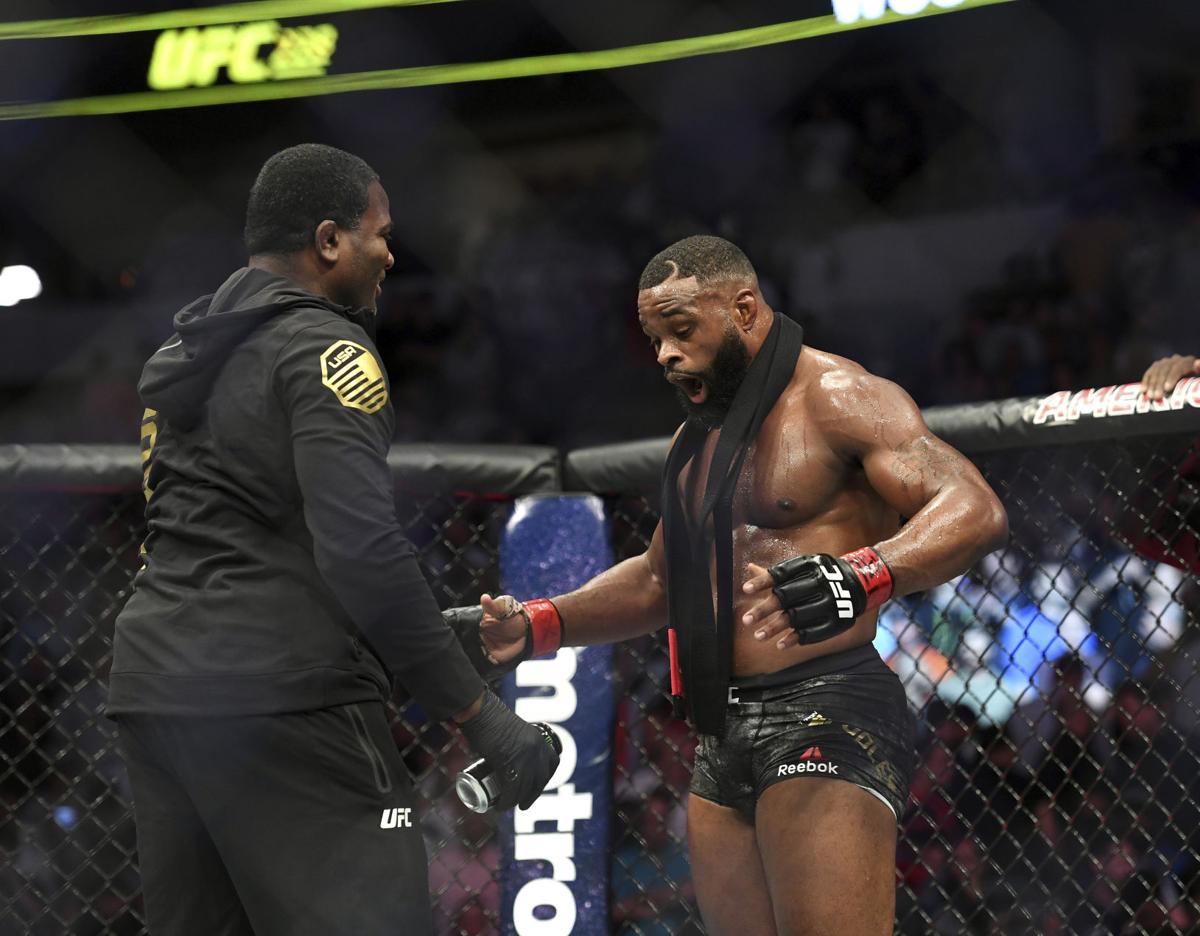 UFC Champ Tyron Woodley surprised by black belt r/jiujitsu