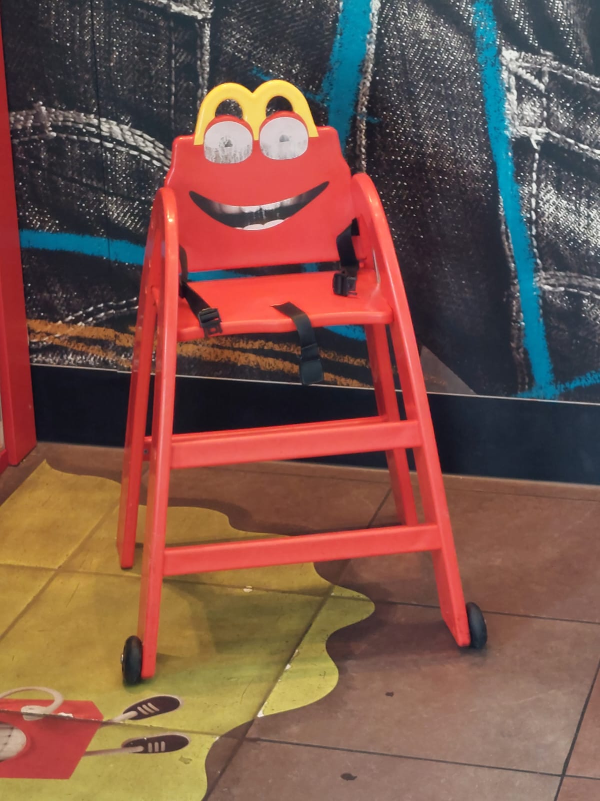 Found this high chair in the corner of a German McDonald's, staring at