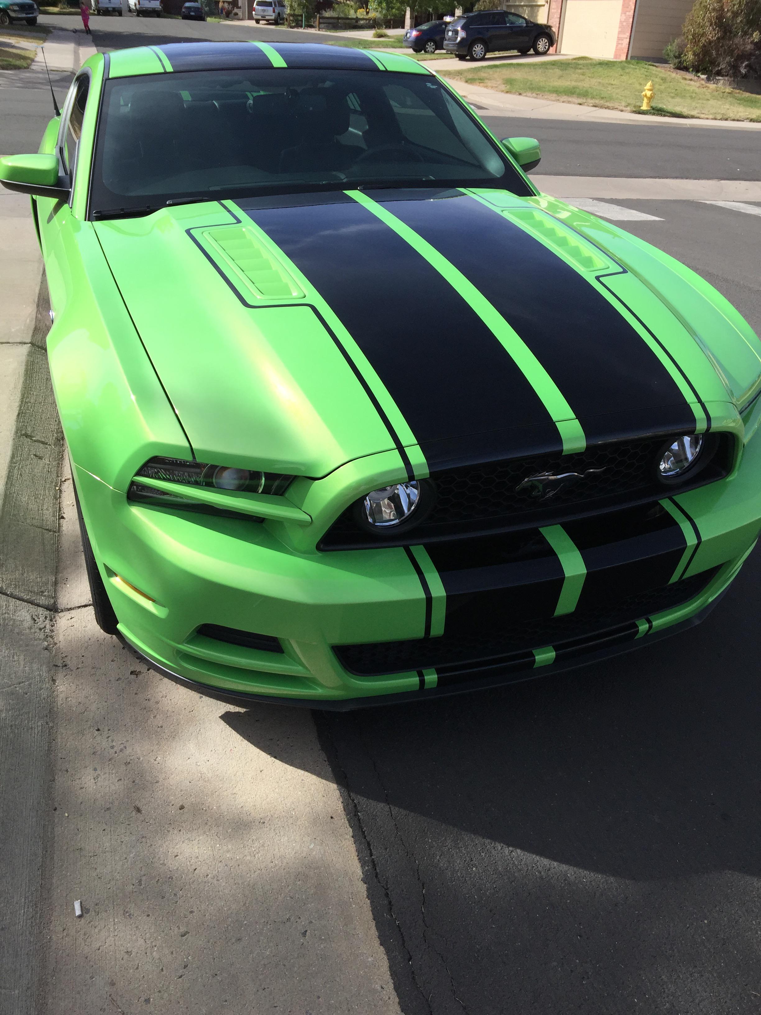 I paid off my 2014 GT Premium Track Package Gotta Have It Green Mustang
