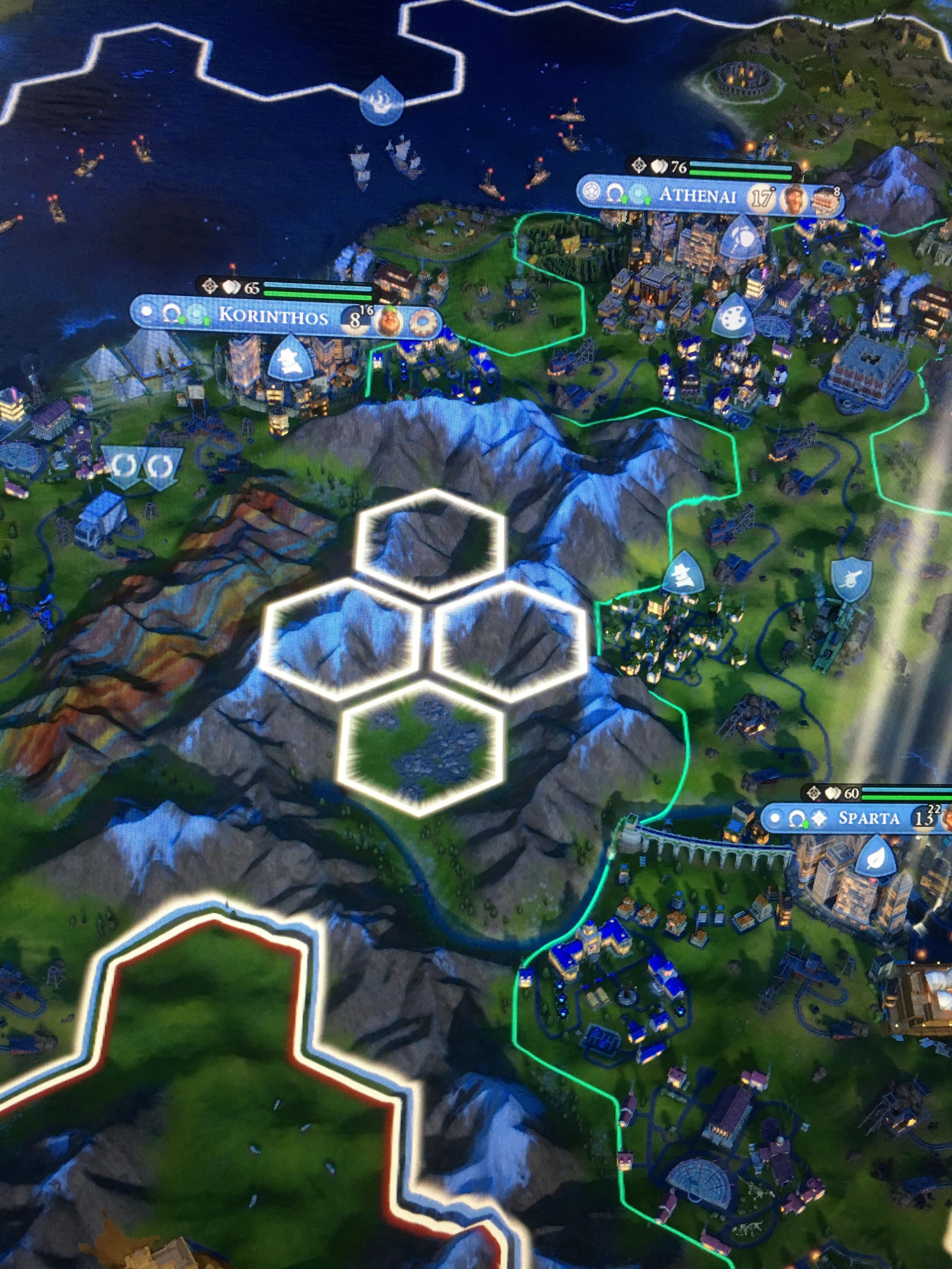 The naturalist unit should be able to move through mountain tiles so I