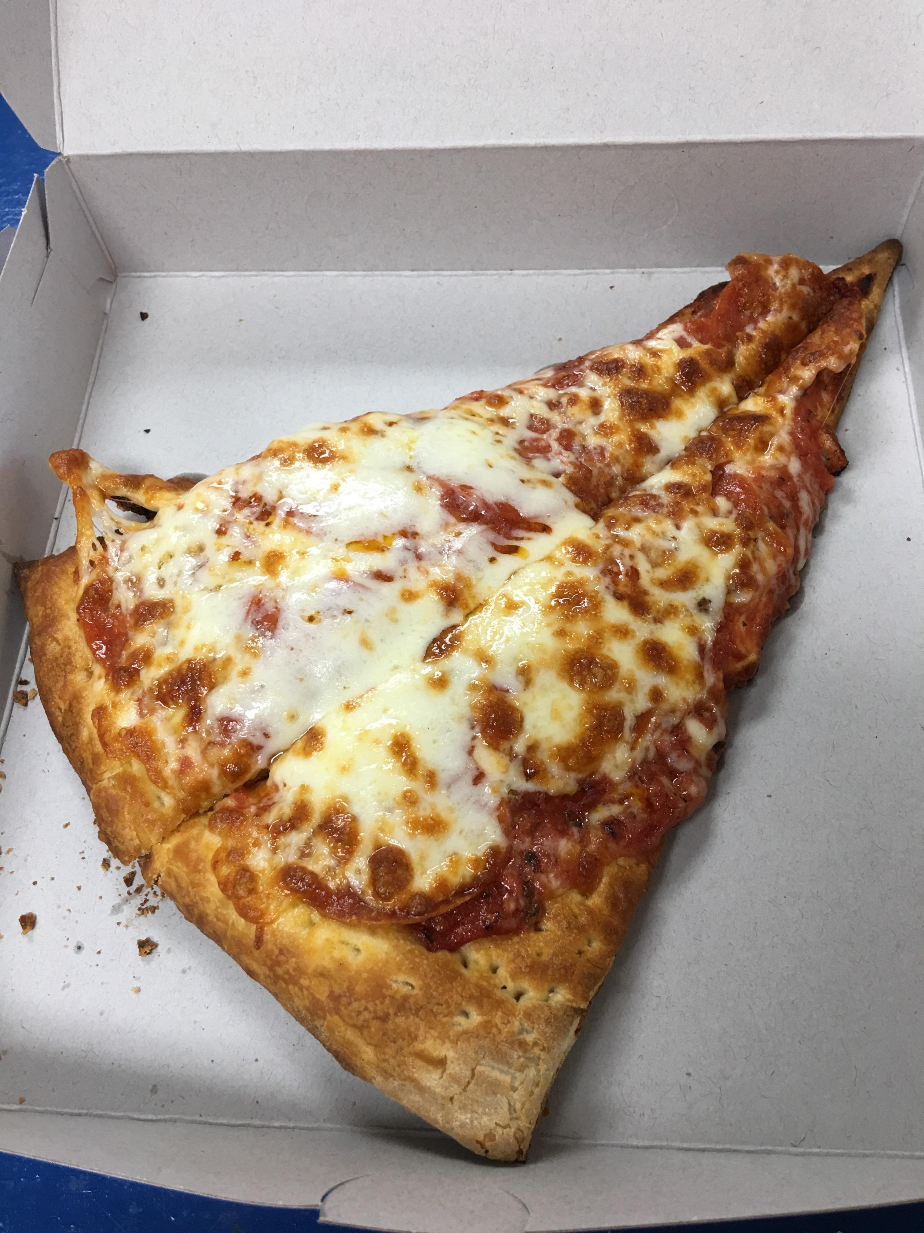 A (coupled) slice of pepperoni and extra cheese from Guido’s in Van