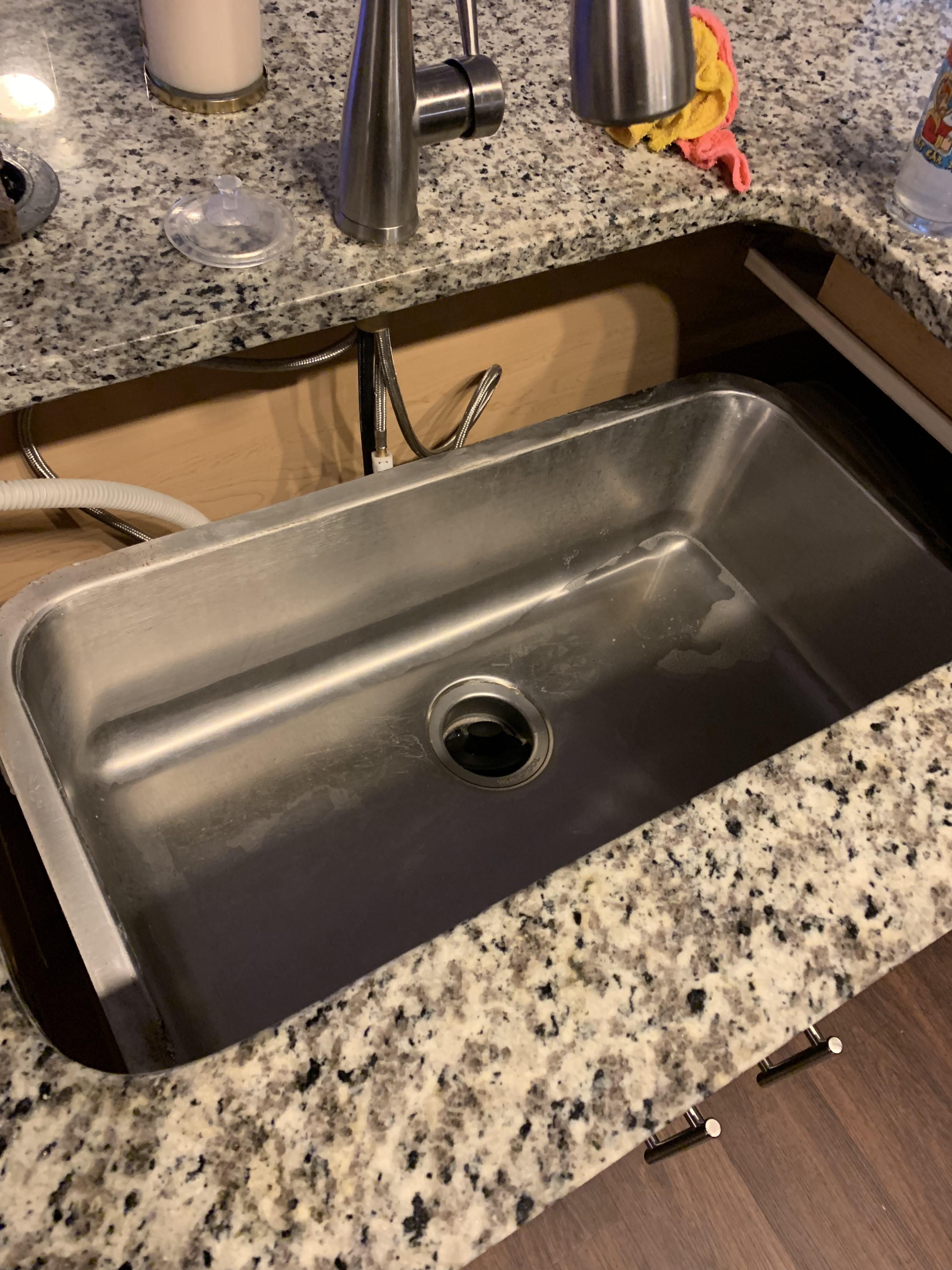 My sink fell through due to horrible glue job. r/mildlyinfuriating