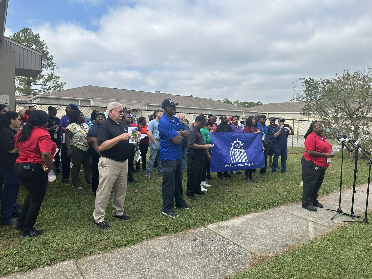 Duval County Schools food service workers rally in front of company HQ
