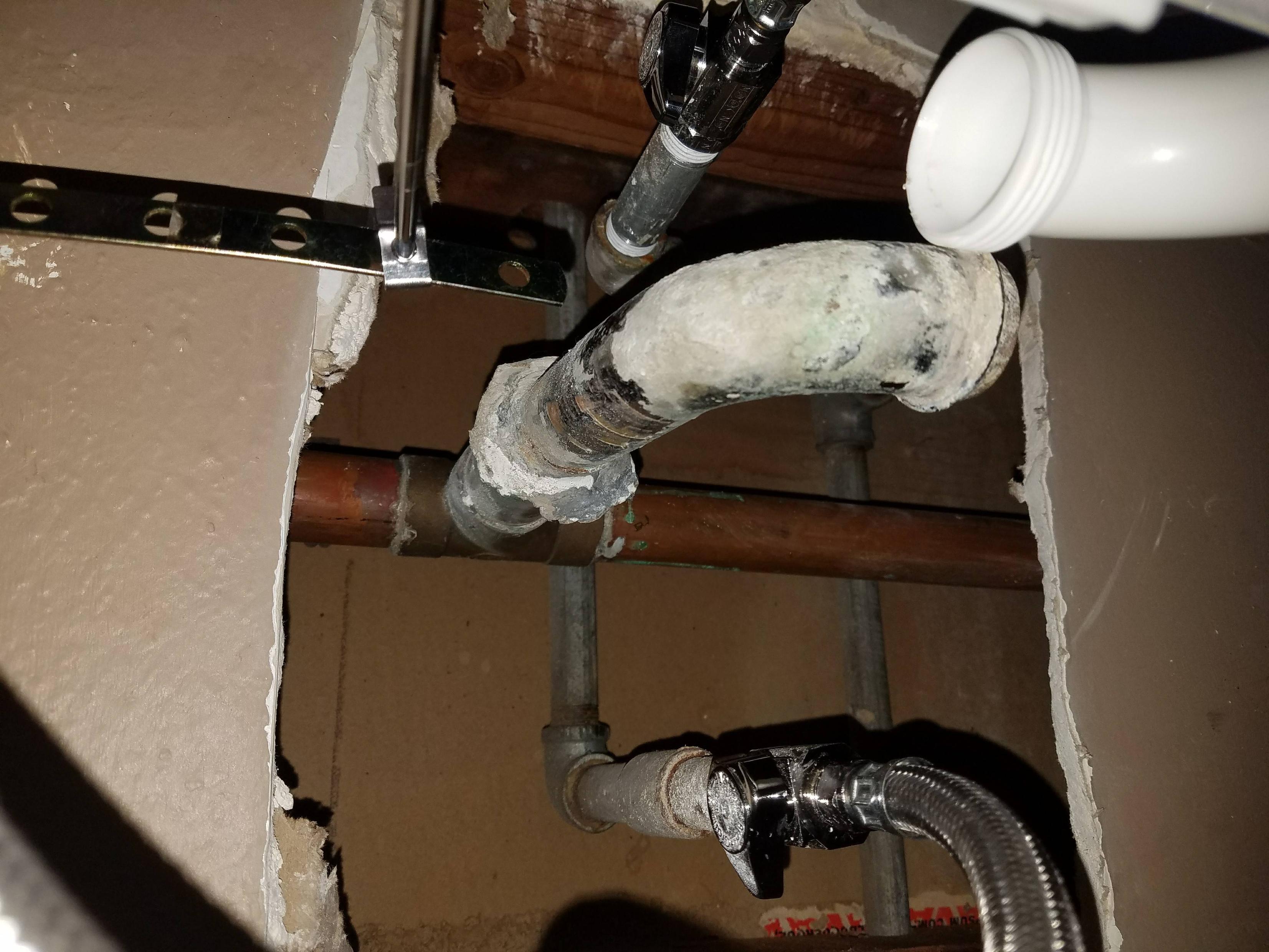 plumbing - Sink P-Trap doesn't line up with Drain pipe - Home