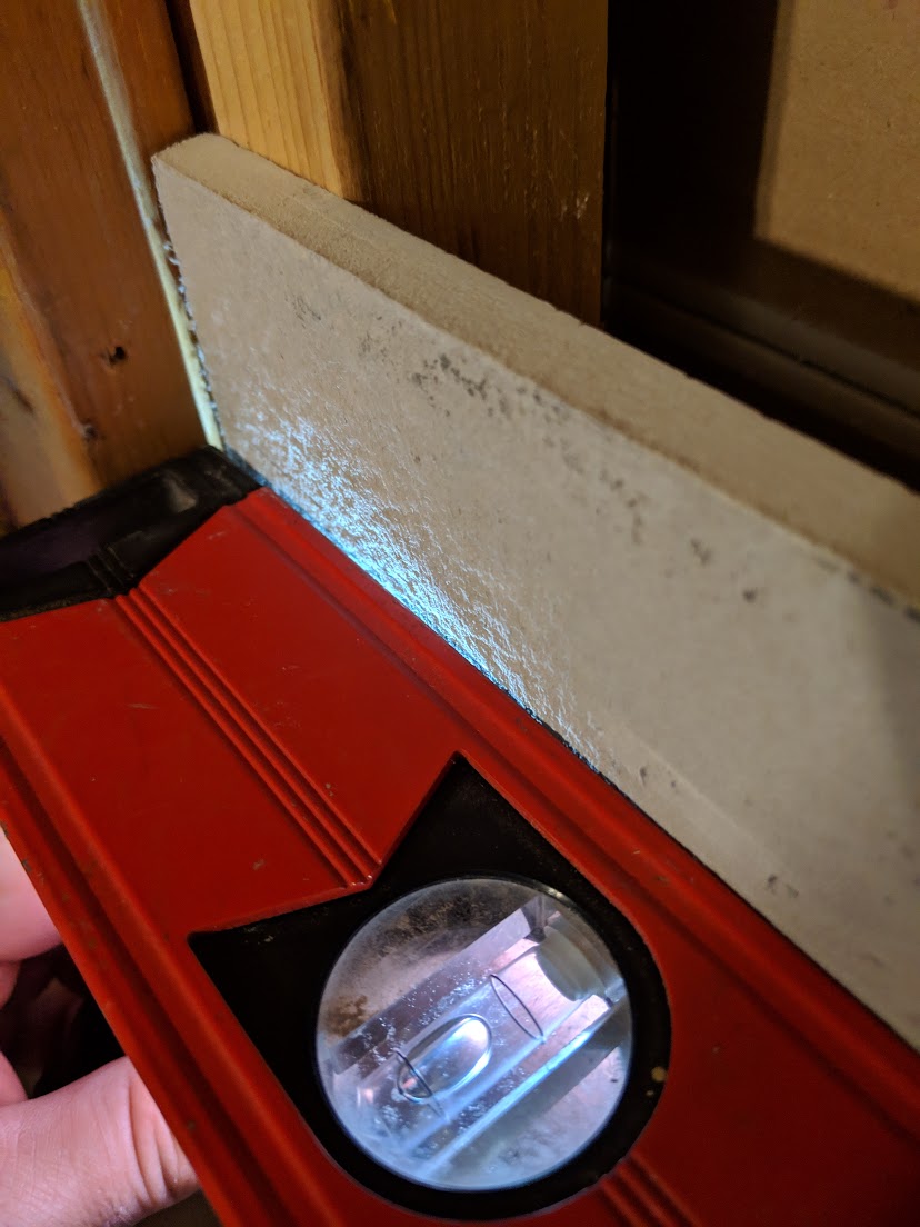 adhesive What to use as void filler behind between shower's studs & cement underlayment board