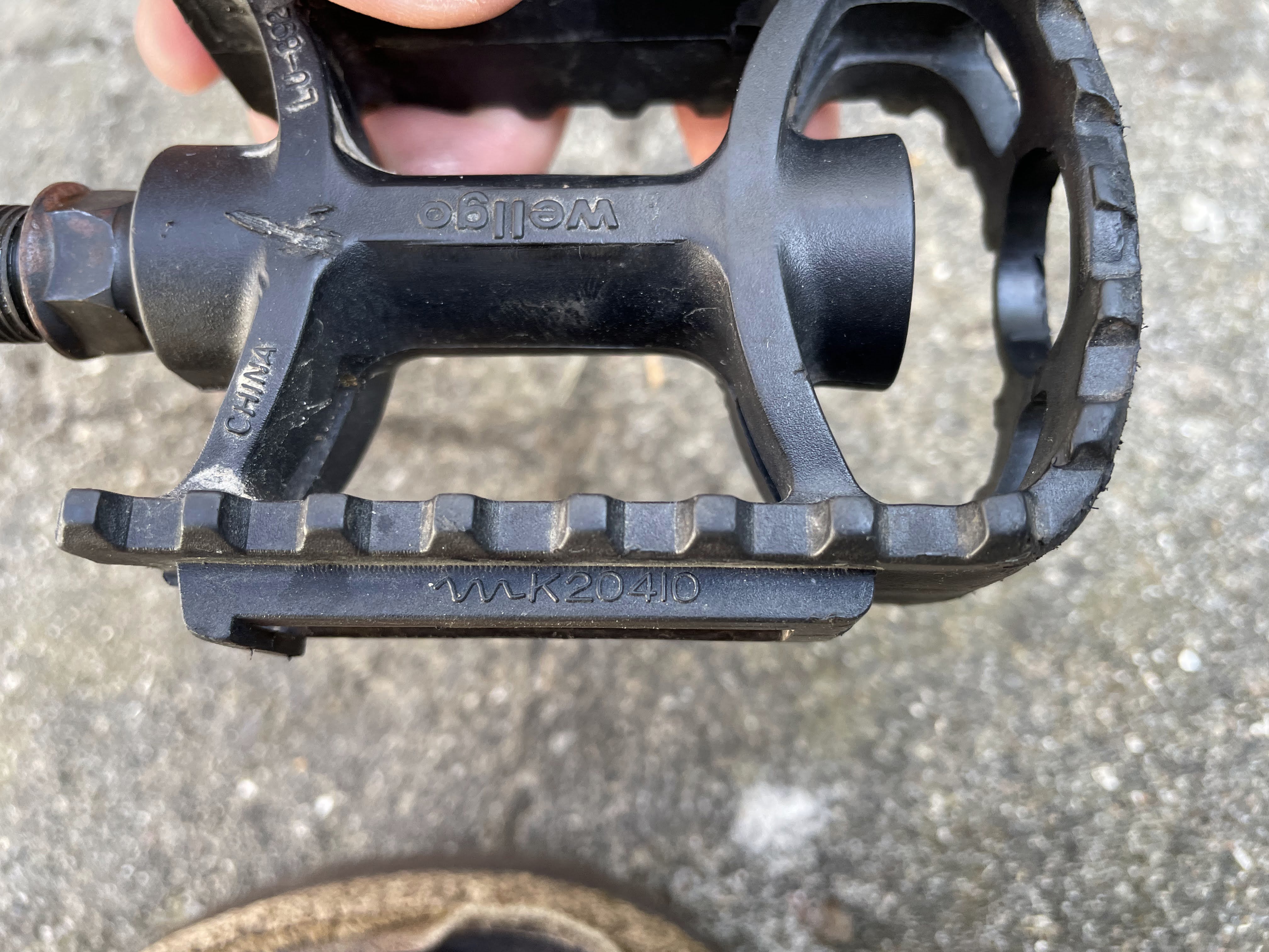 How do I take apart Wellgo pedal (to lubricate bearings)? Bicycles