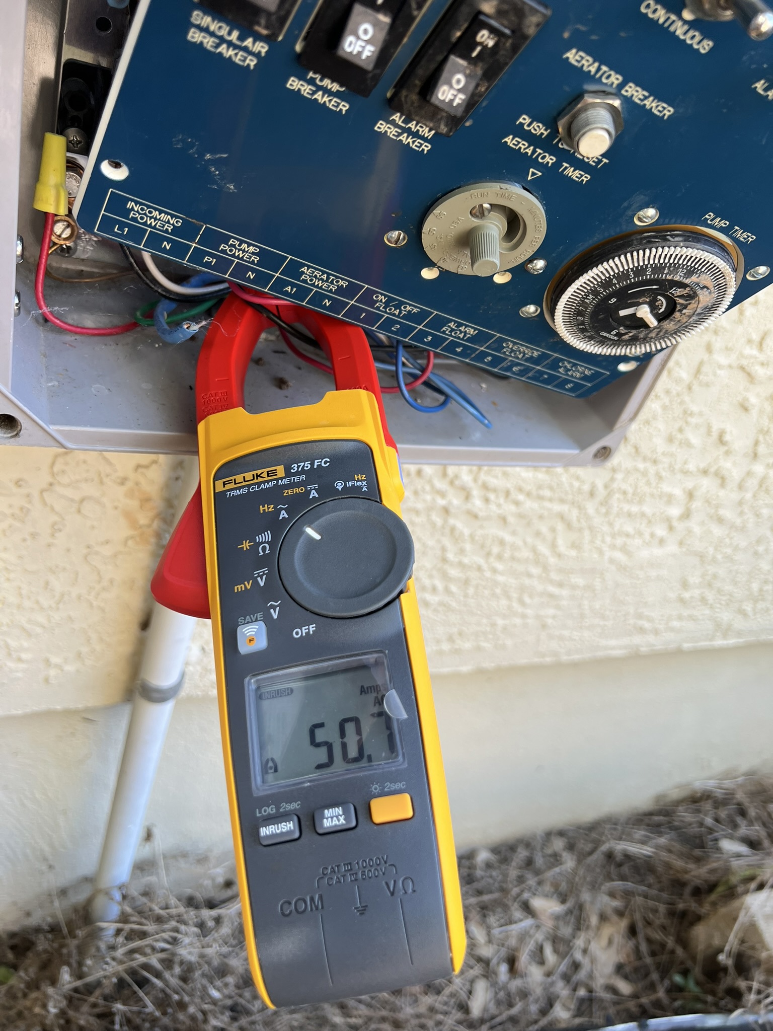 electrical panel Septic system's old and new pump tripping circuit