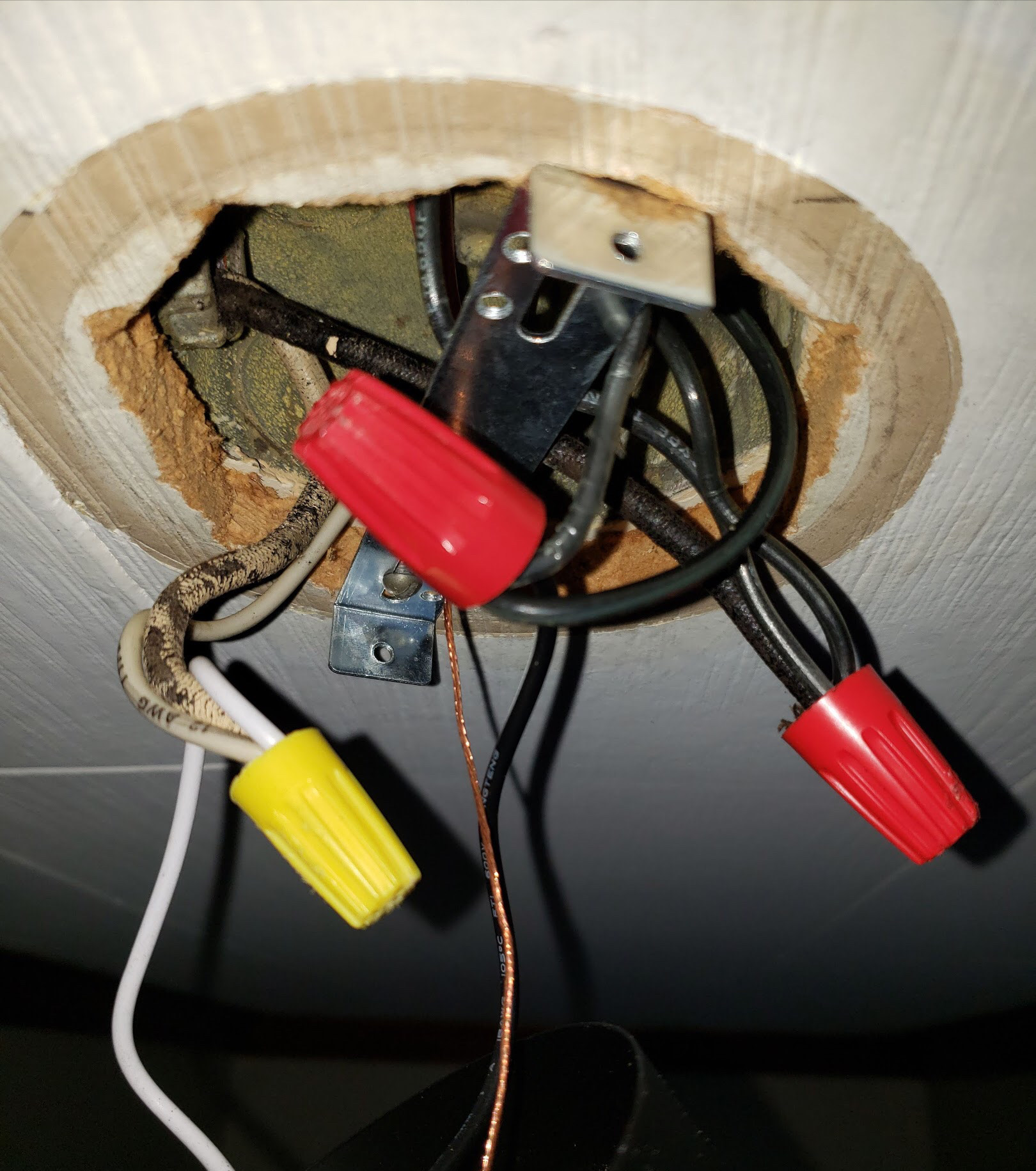 electrical I replaced a light fixture, now one specific outlet doesn