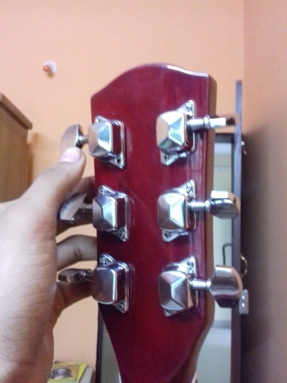 Tuning peg tight on a guitar (possibly slipping, too) Music Practice