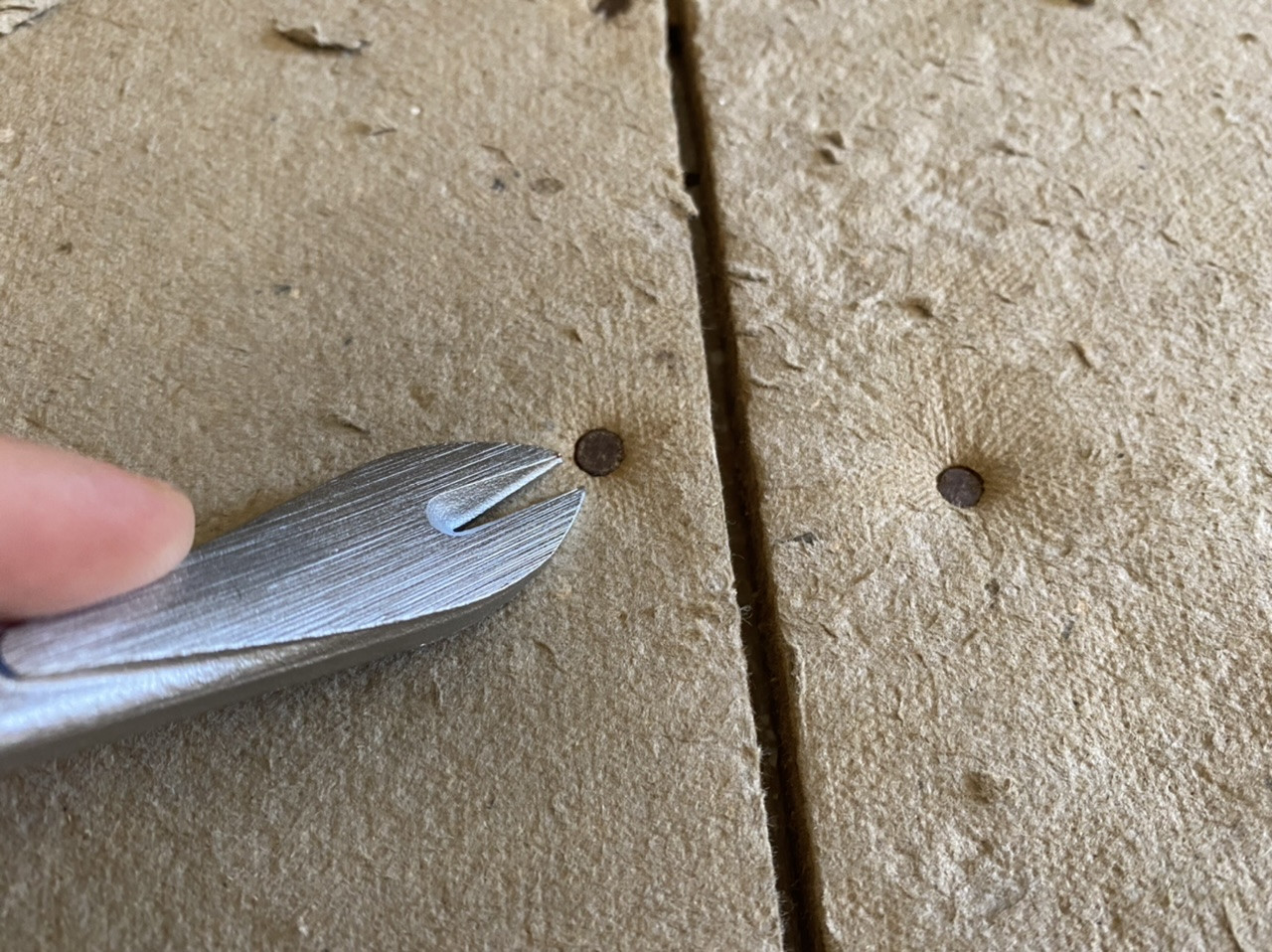 flooring How to remove small nails from Homasote? Home Improvement