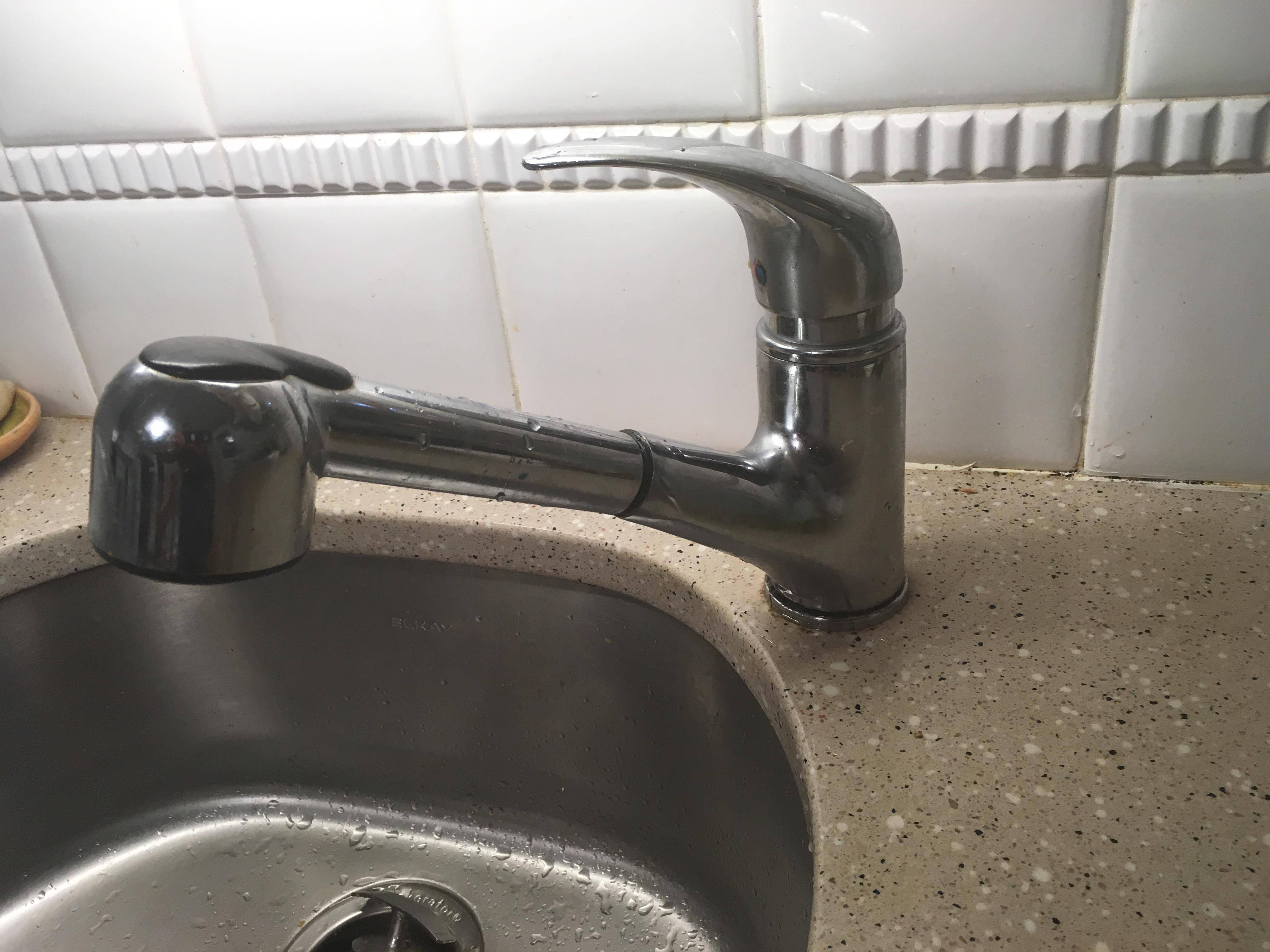 How to approach fixing this kitchen sink faucet leak at the base Home