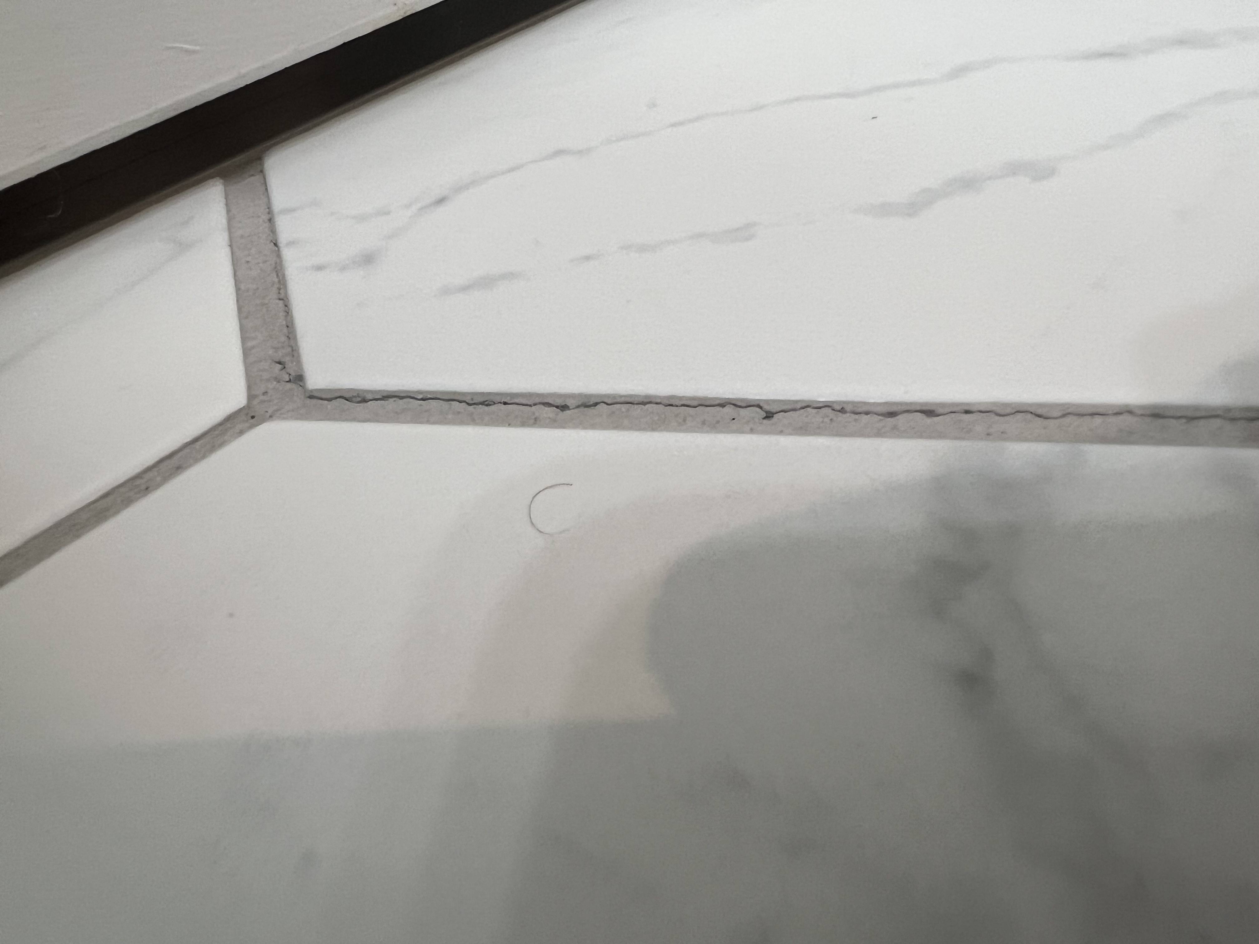 bathroom Are tile popping sounds & grout cracks signs of subfloor