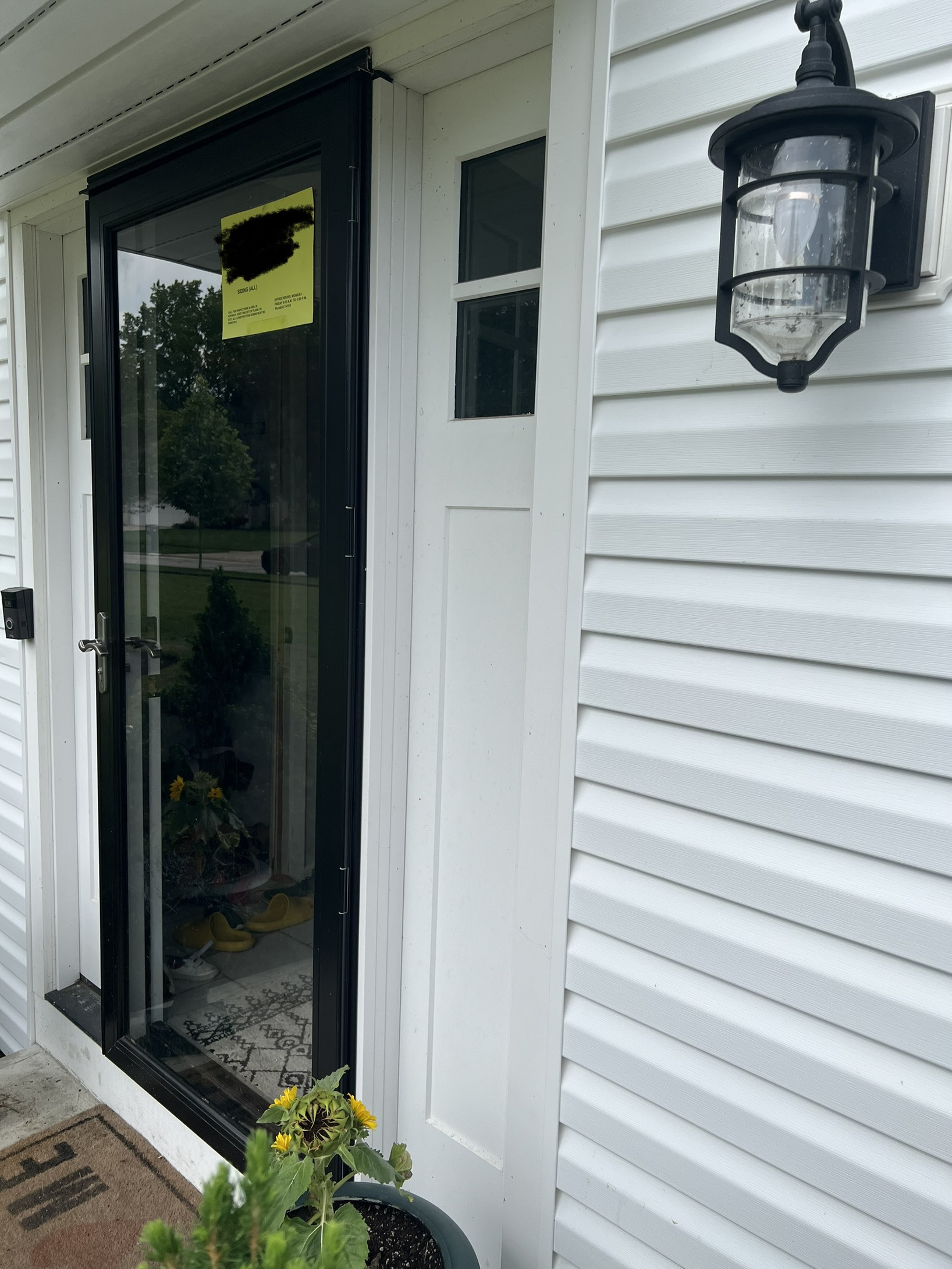 What's the best way to secure a flexing storm door jamb? Home
