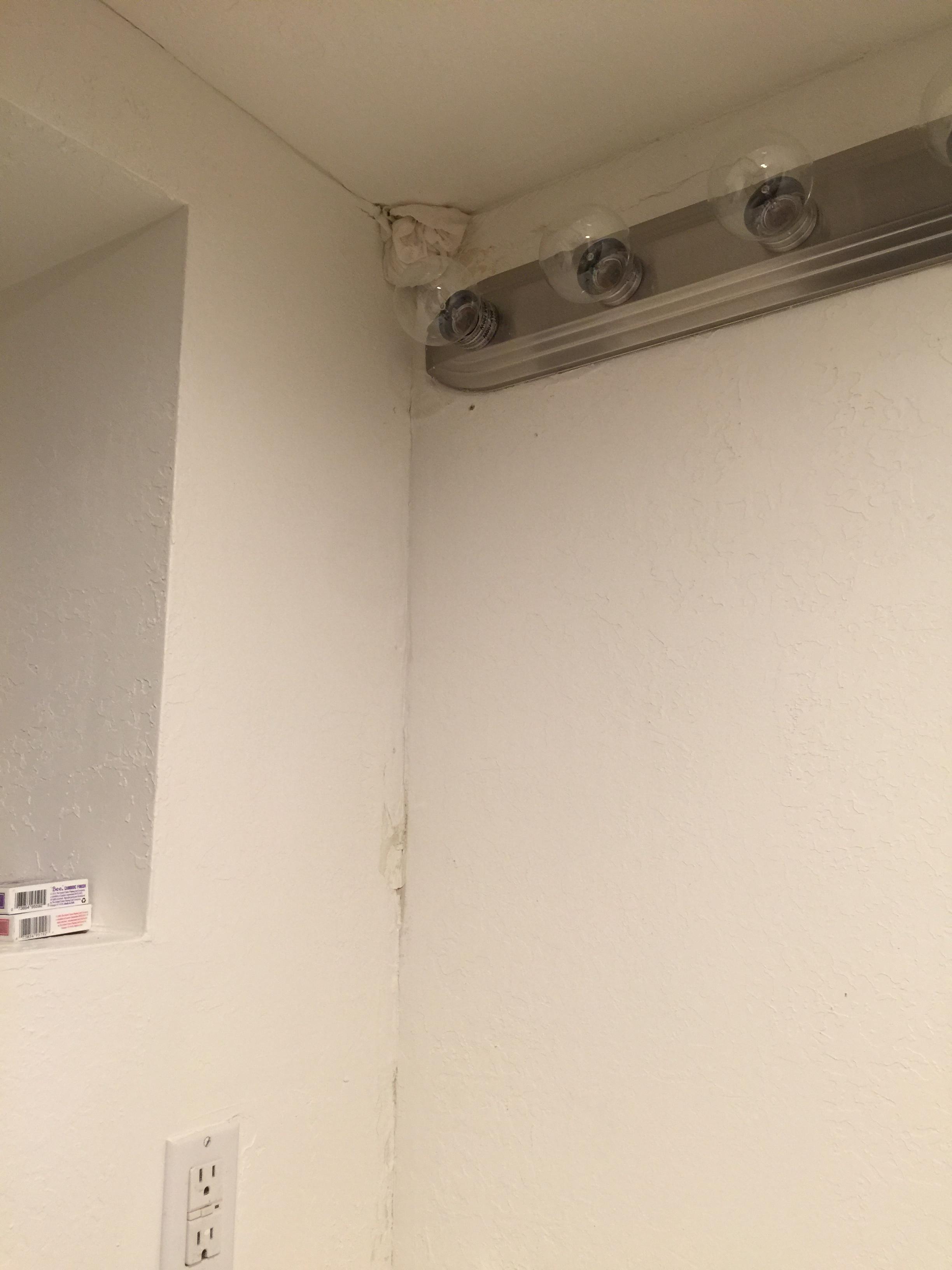 damage Water Leaking From Upstairs Restroom Down to Basement Restroom