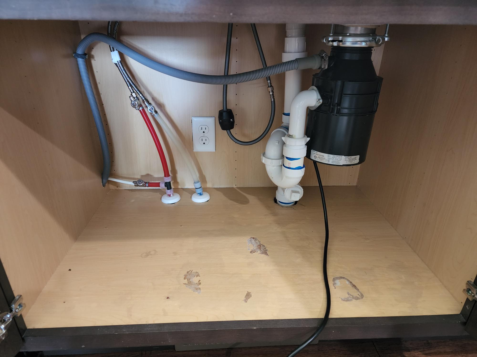 Water Under The Kitchen Cabinets