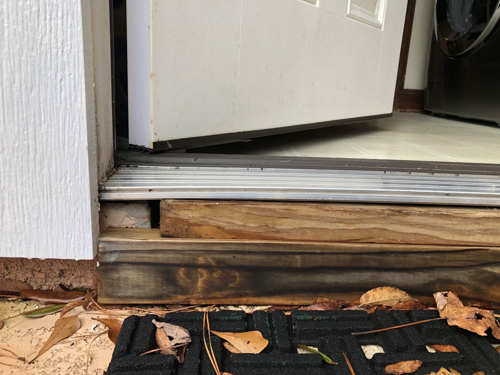 wood How to repair a bulged exterior door threshold? Home