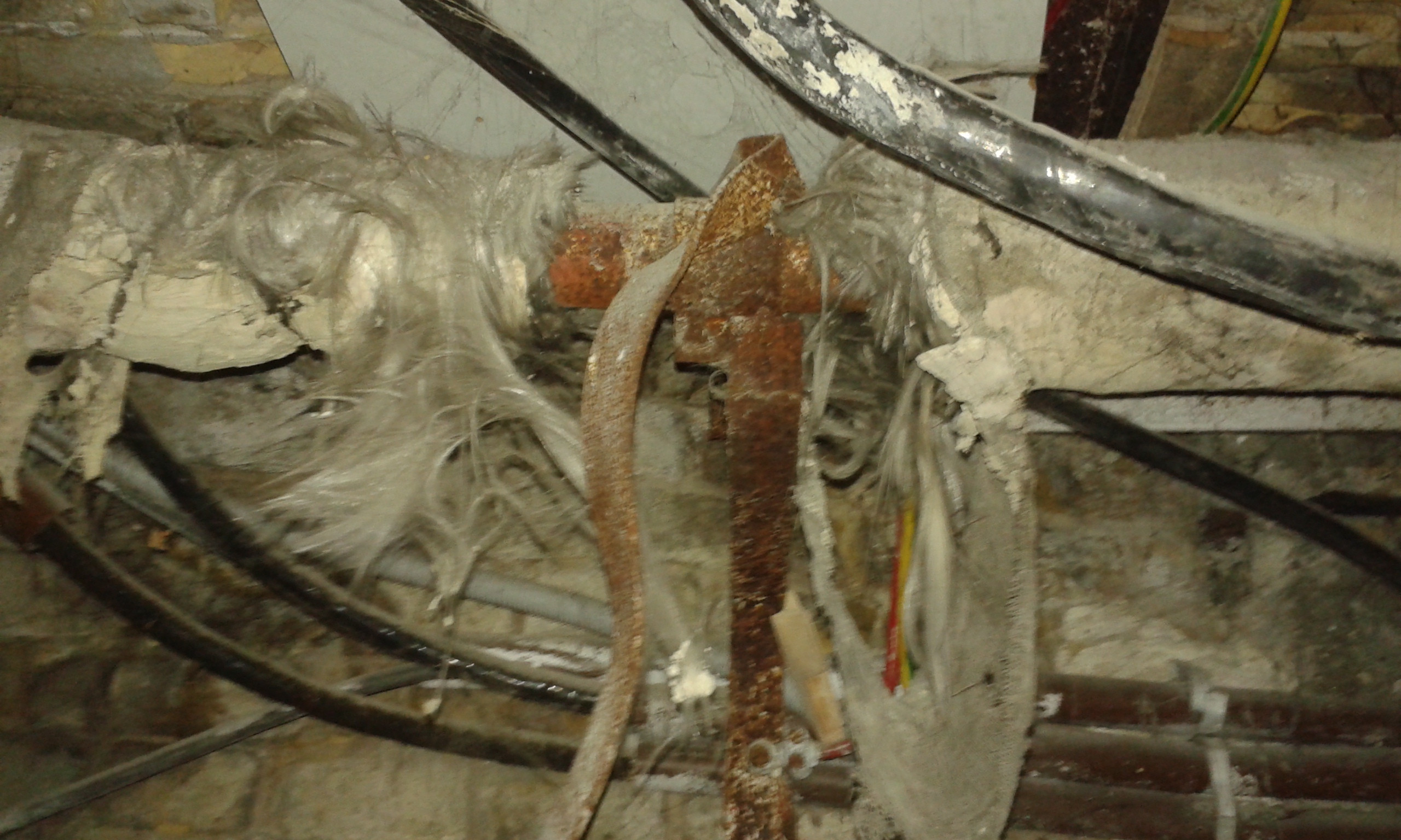 Should I worry about this pipe insulation? (fiberglass vs asbestos