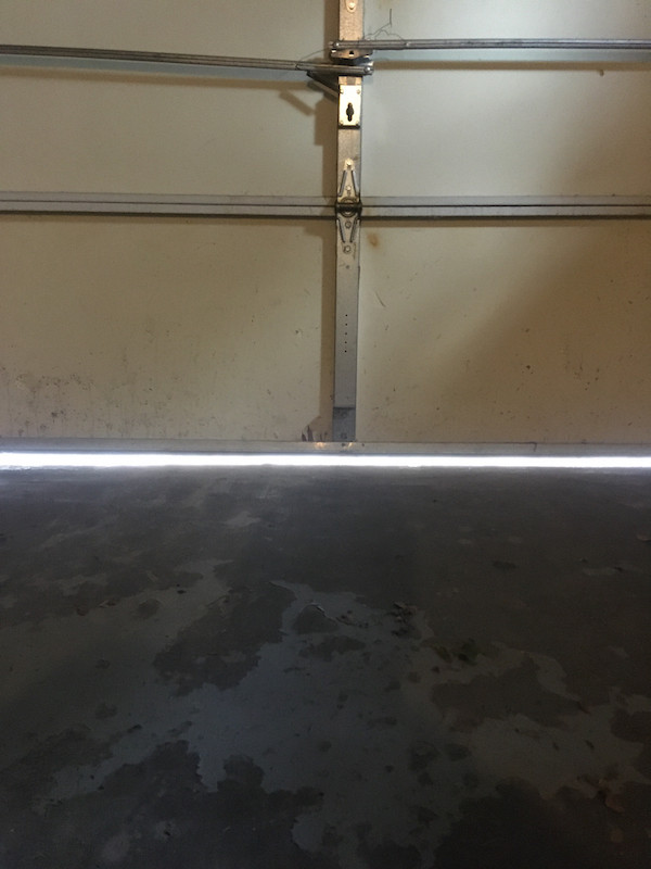 What solutions exsist to fill in the gap between the bottom of garage