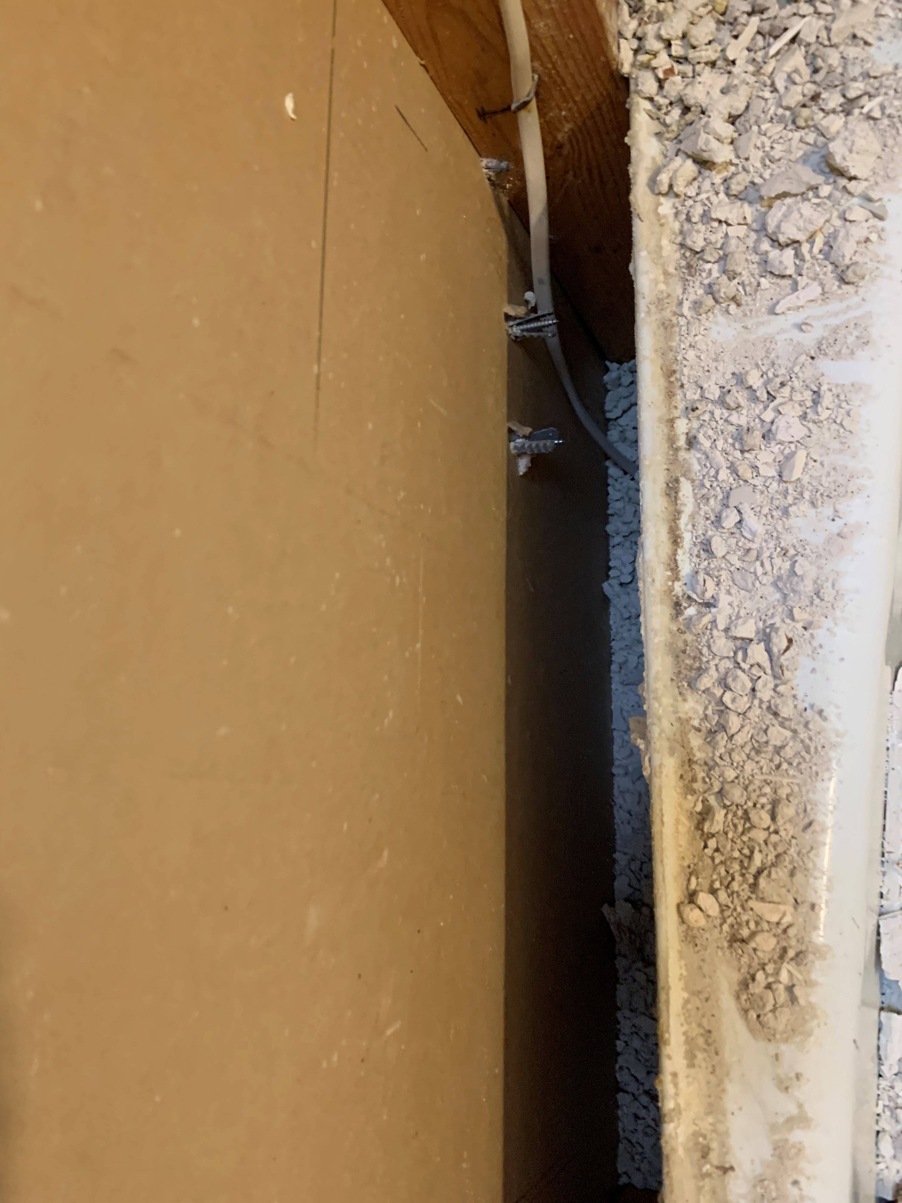 How do I reinforce wall anchors used to hang kitchen Home