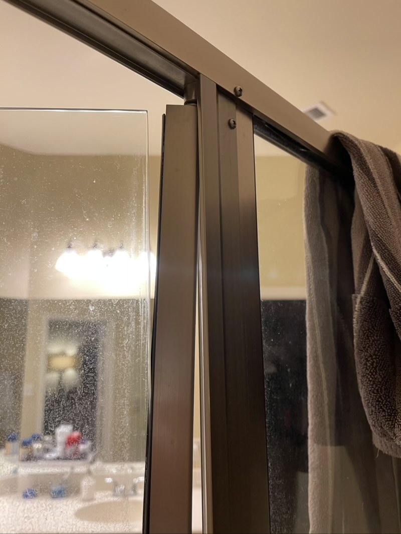 bathroom How can I repair my sagging shower door? Home Improvement