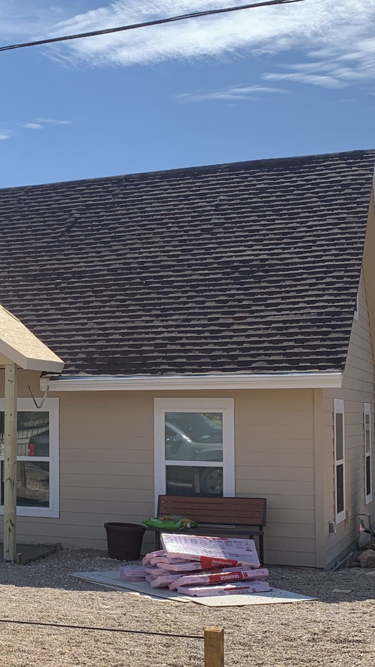 roofing Could shingles that are not flat be caused by stapling the sheathing rather than