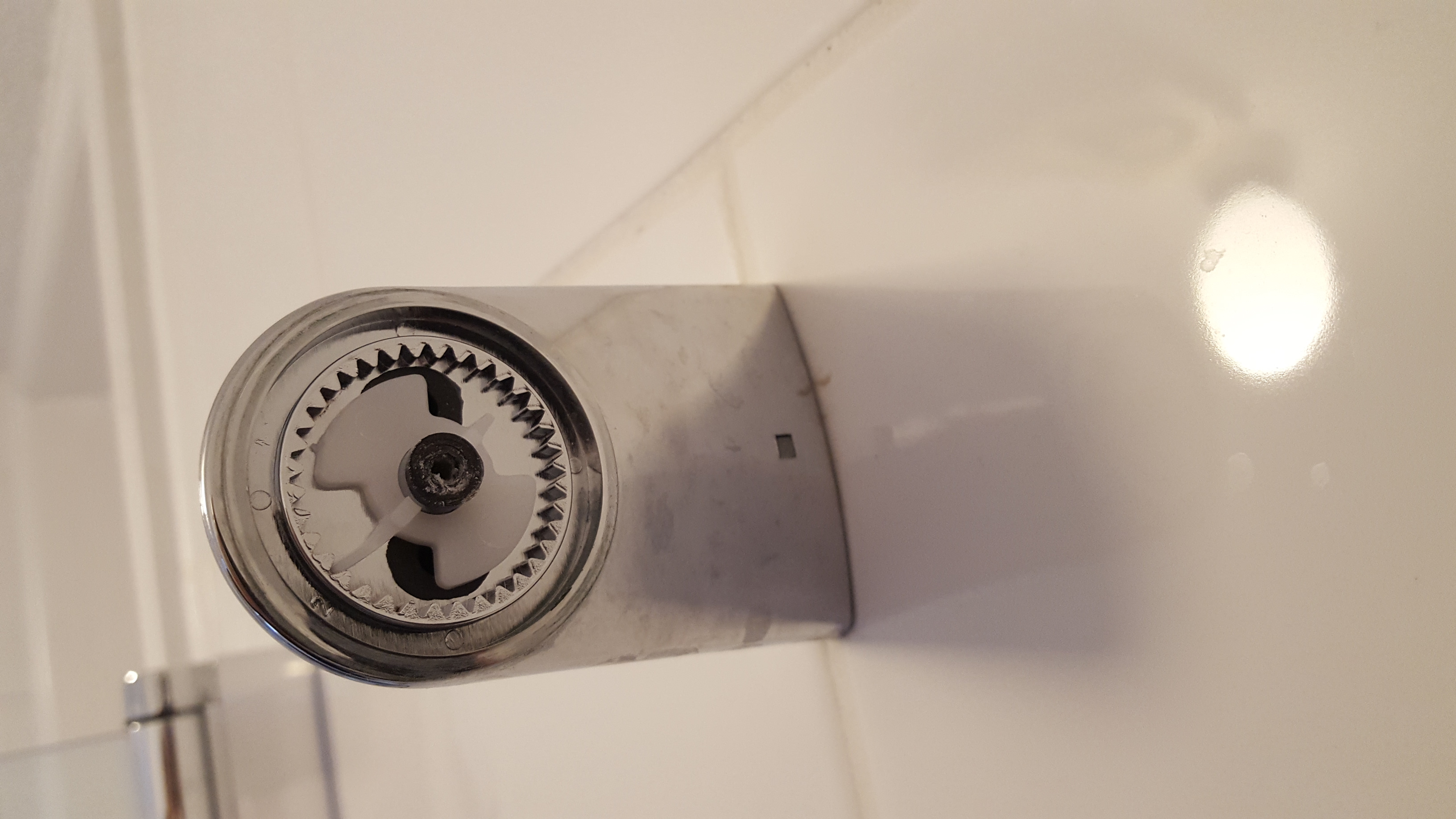 bathroom How can I tighten my shower head holder so that it doesn't slip and let the shower