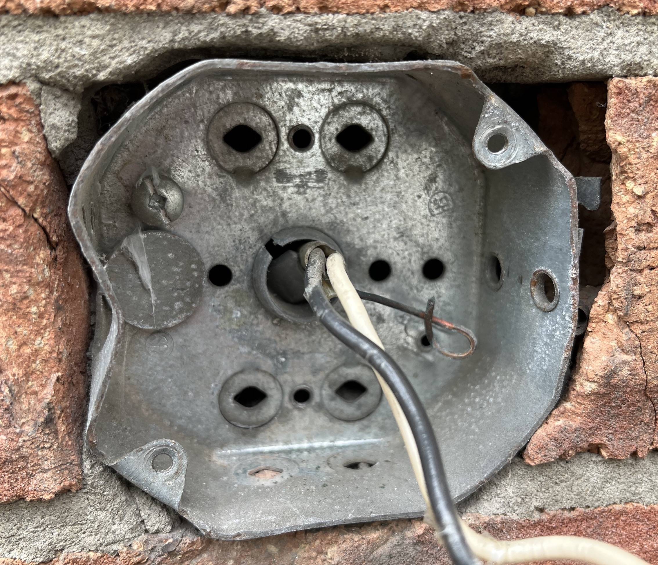 electrical - Securing a junction box to an exterior brick wall - Home