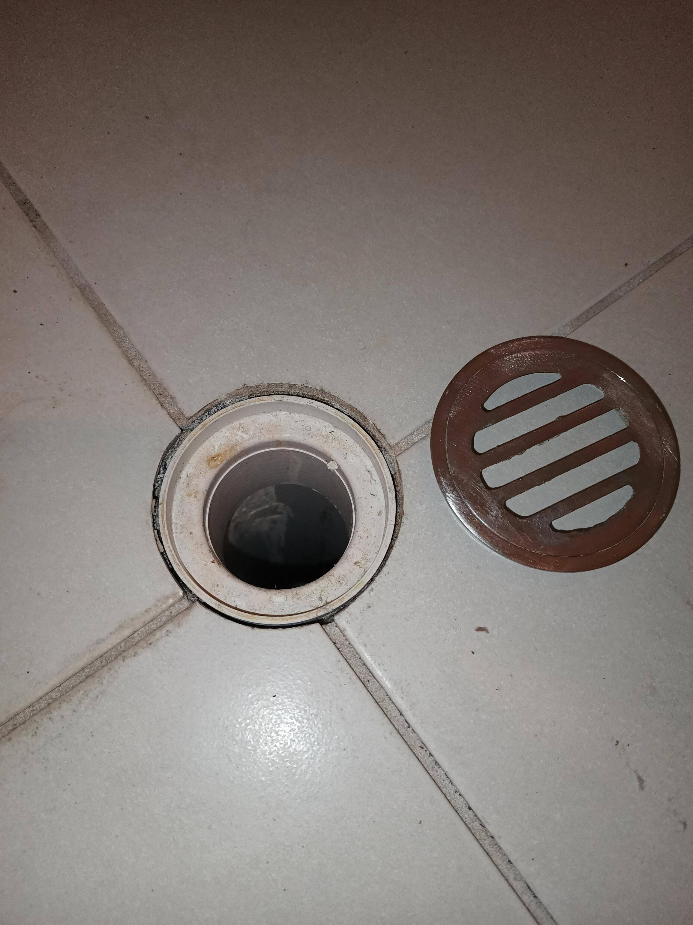 How to fix this shower drain cover? Home Improvement Stack Exchange