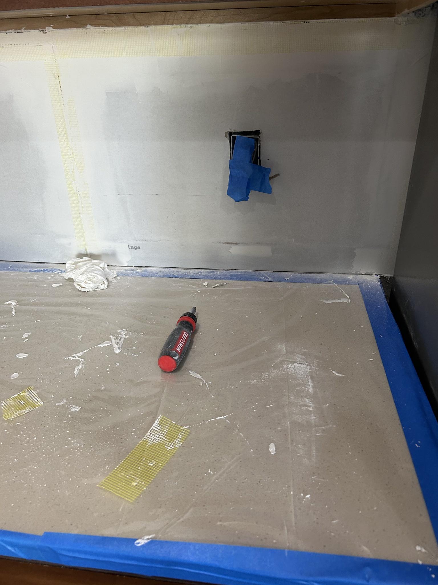 drywall How can I fill gaps at counter level for backsplash tile