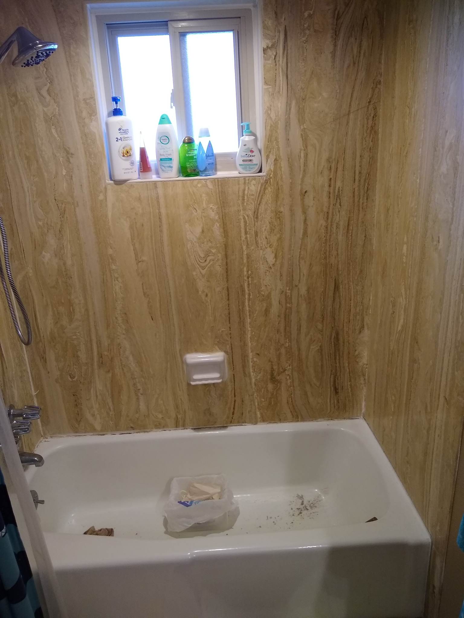 How to remove plaster or really old hard caulk (can't tell) from bathtub? Home Improvement