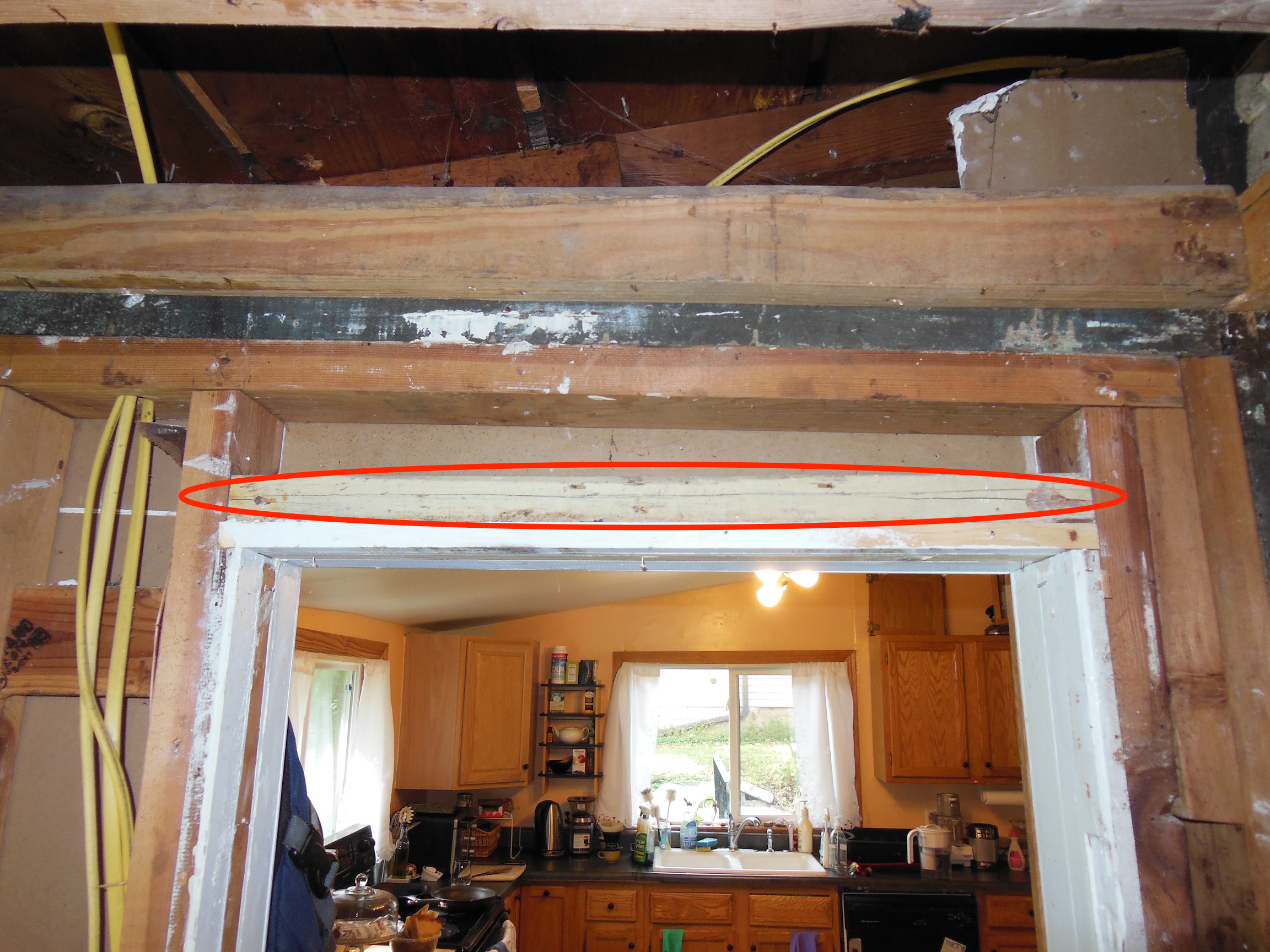 doors What is the point of this doorway "header", and can I simply