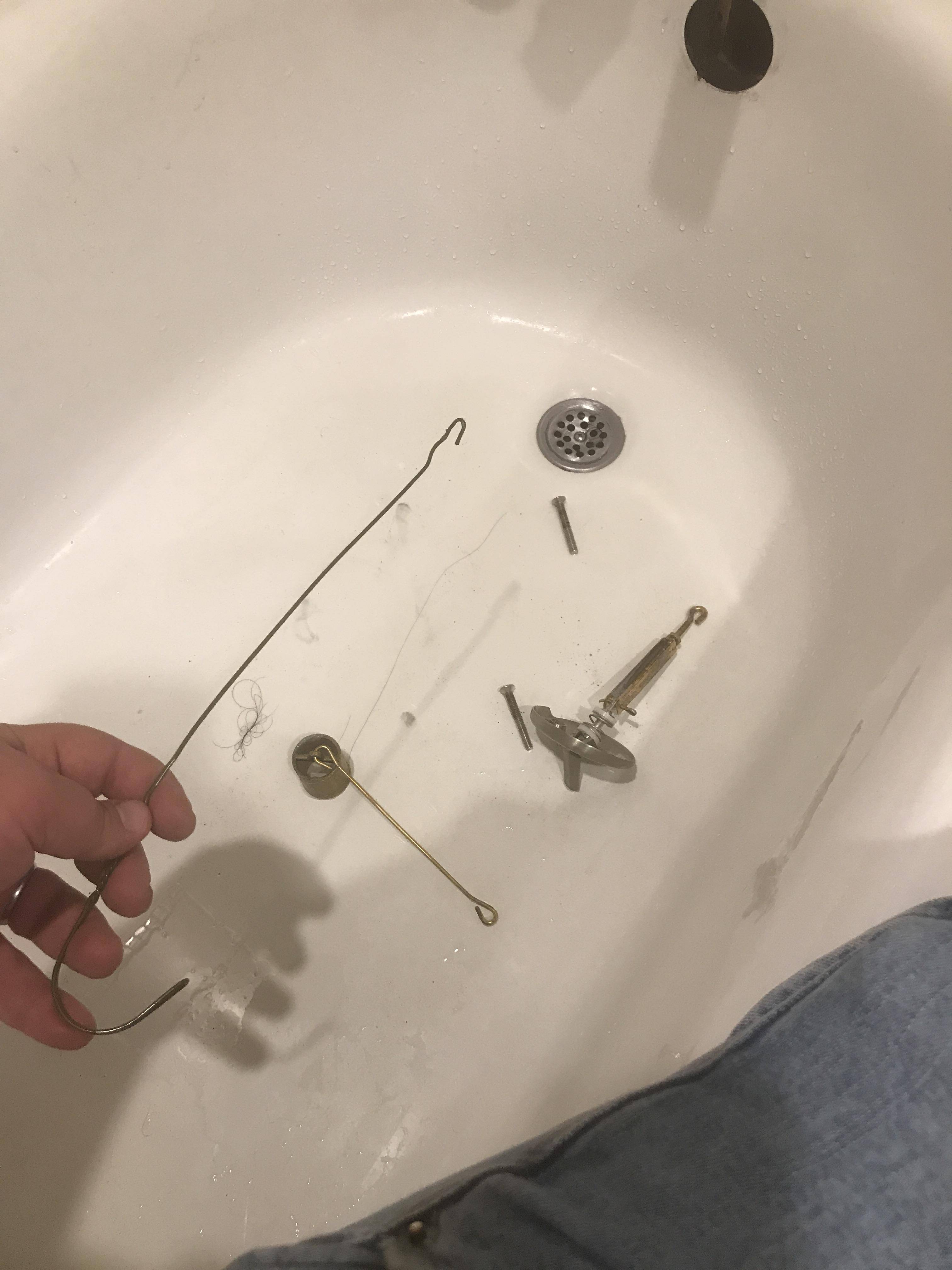 plumbing How do I retrieve a detached plunger from a bathtub drain