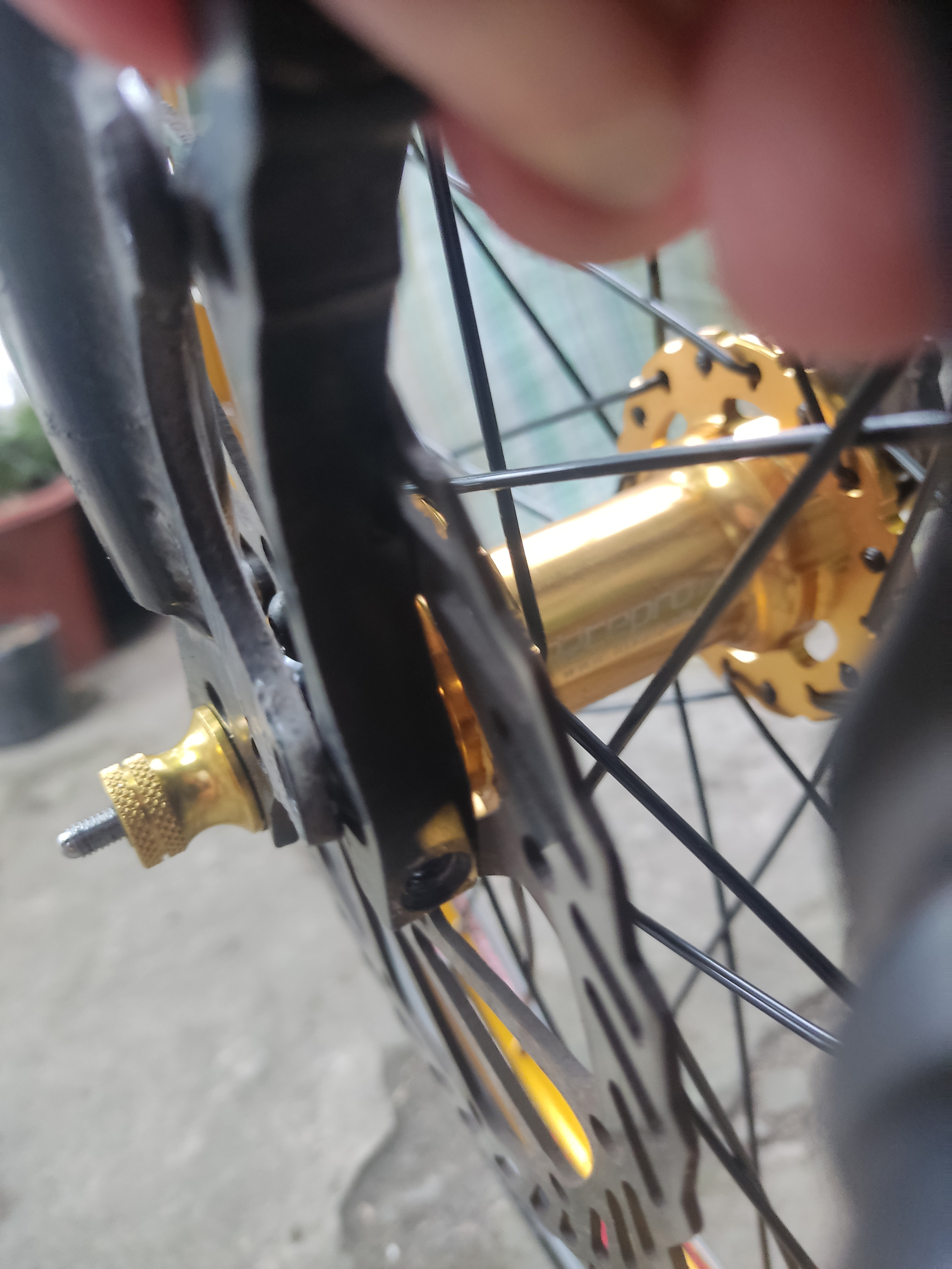 Installed new rim and hubs. Disc rotor is now rubbing against disc