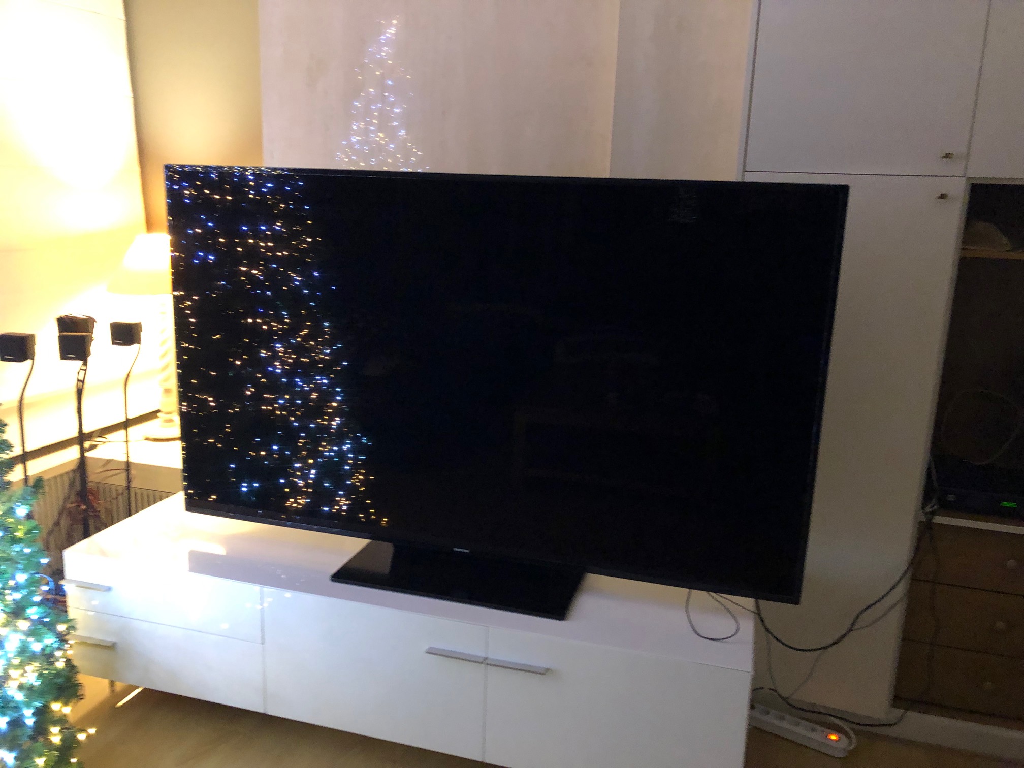 walls creating a frame in an old tv closet to hang a tv too big for