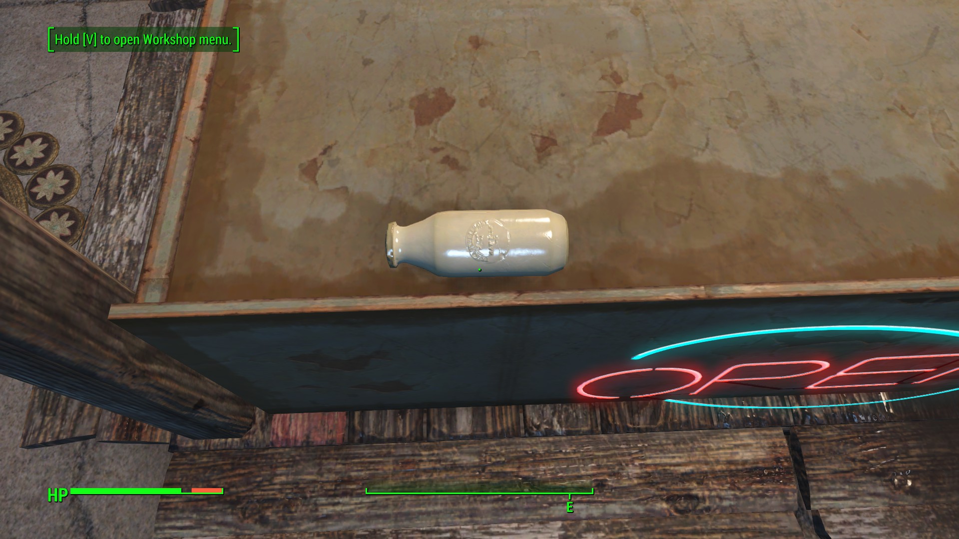 What does the embossed text say on the "empty milk bottle" in Fallout 4
